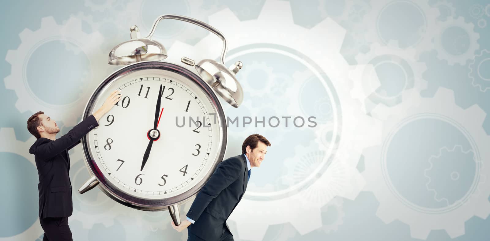 Businessman with arms raised catching something against white wheels and cogs on blue