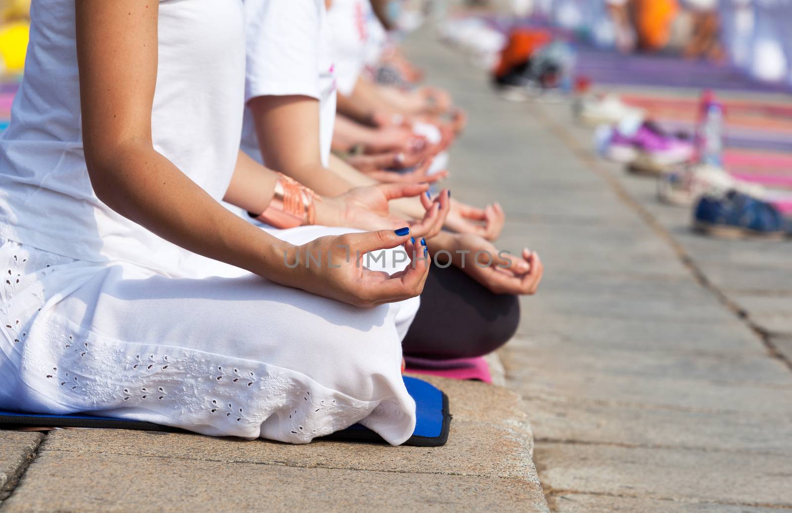 A group of women practicing yoga outdoor