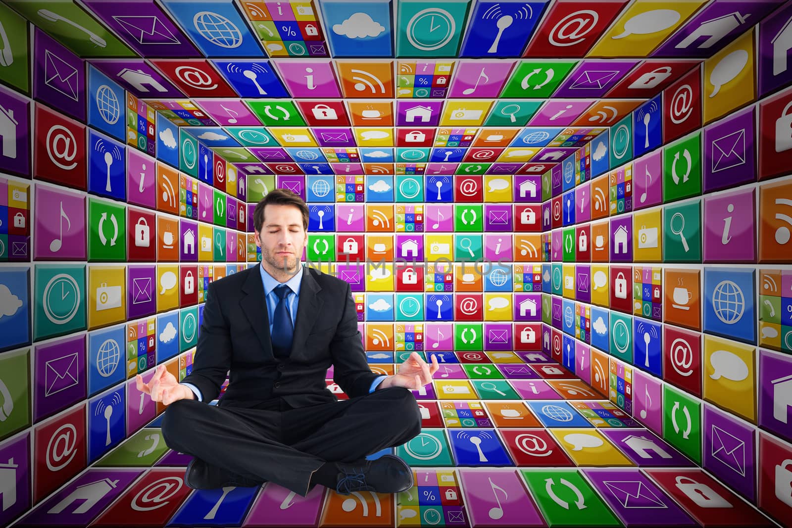 Calm businessman sitting in lotus pose against app room
