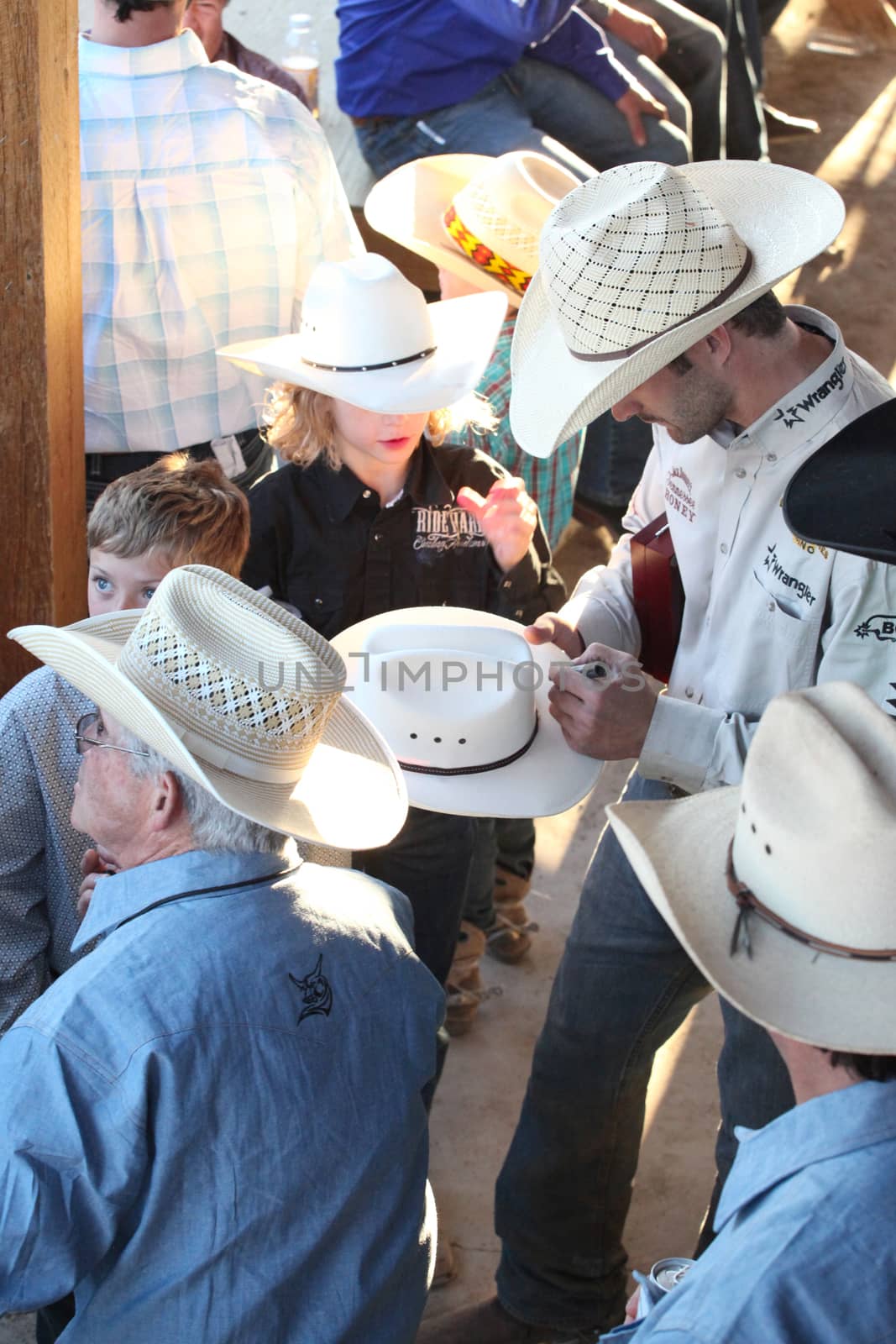 MERRITT; B.C. CANADA - May 30; 2015: Fans receiving autographs at The 3rd Annual Ty Pozzobon Invitational PBR Event.