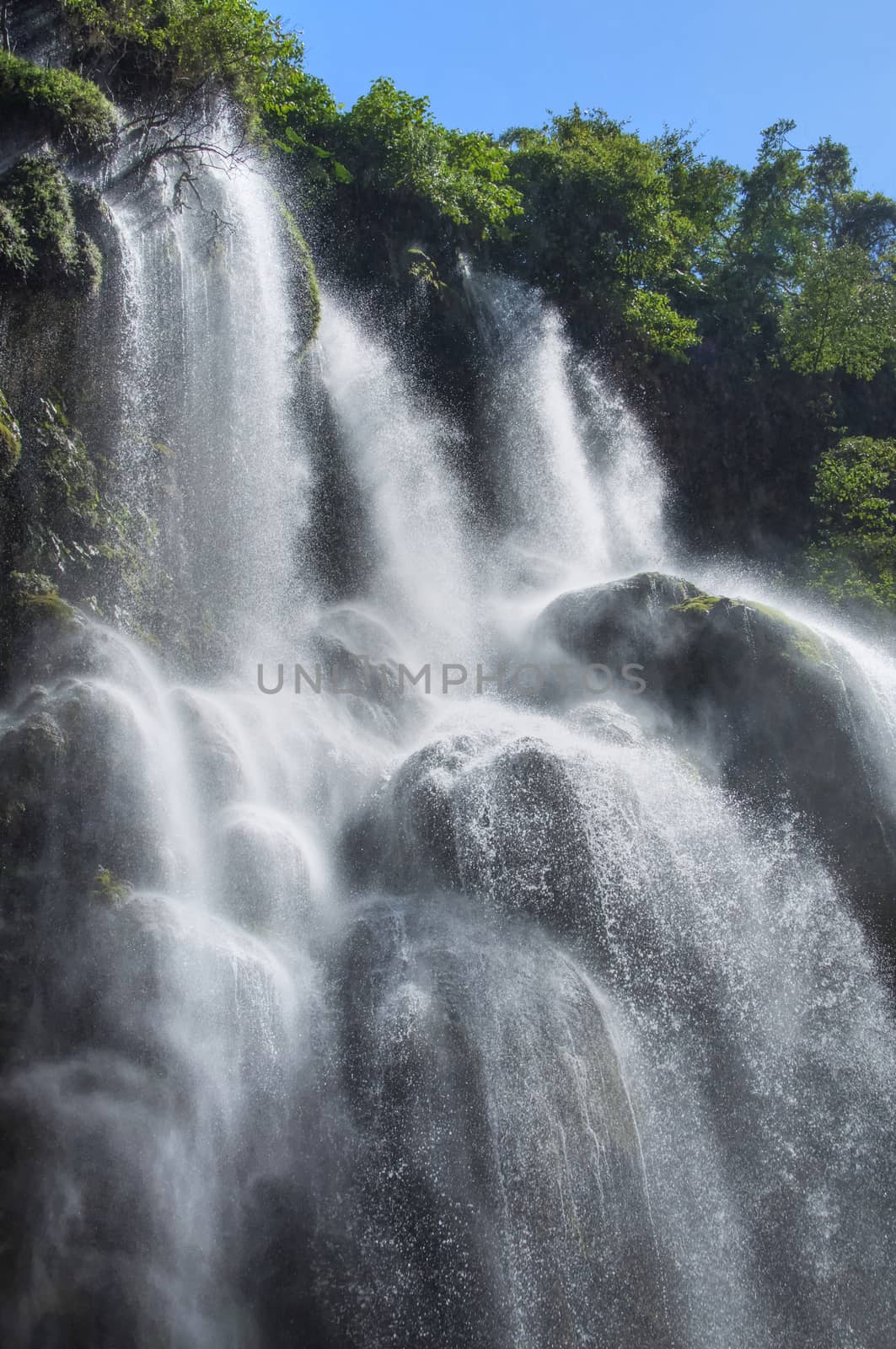 Tropical waterfall by shakzu
