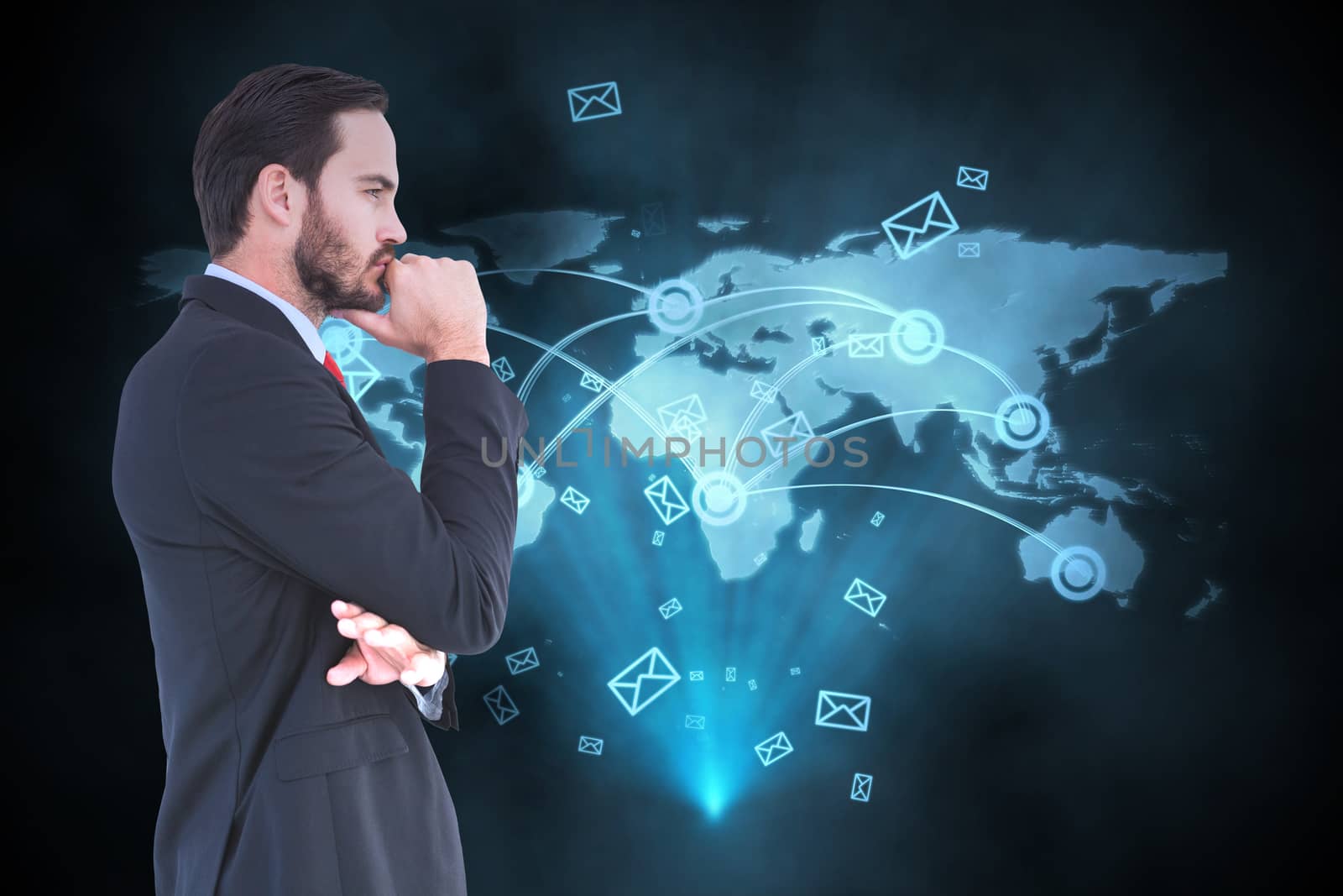 Thinking businessman standing with hand on chin against futuristic technology interface