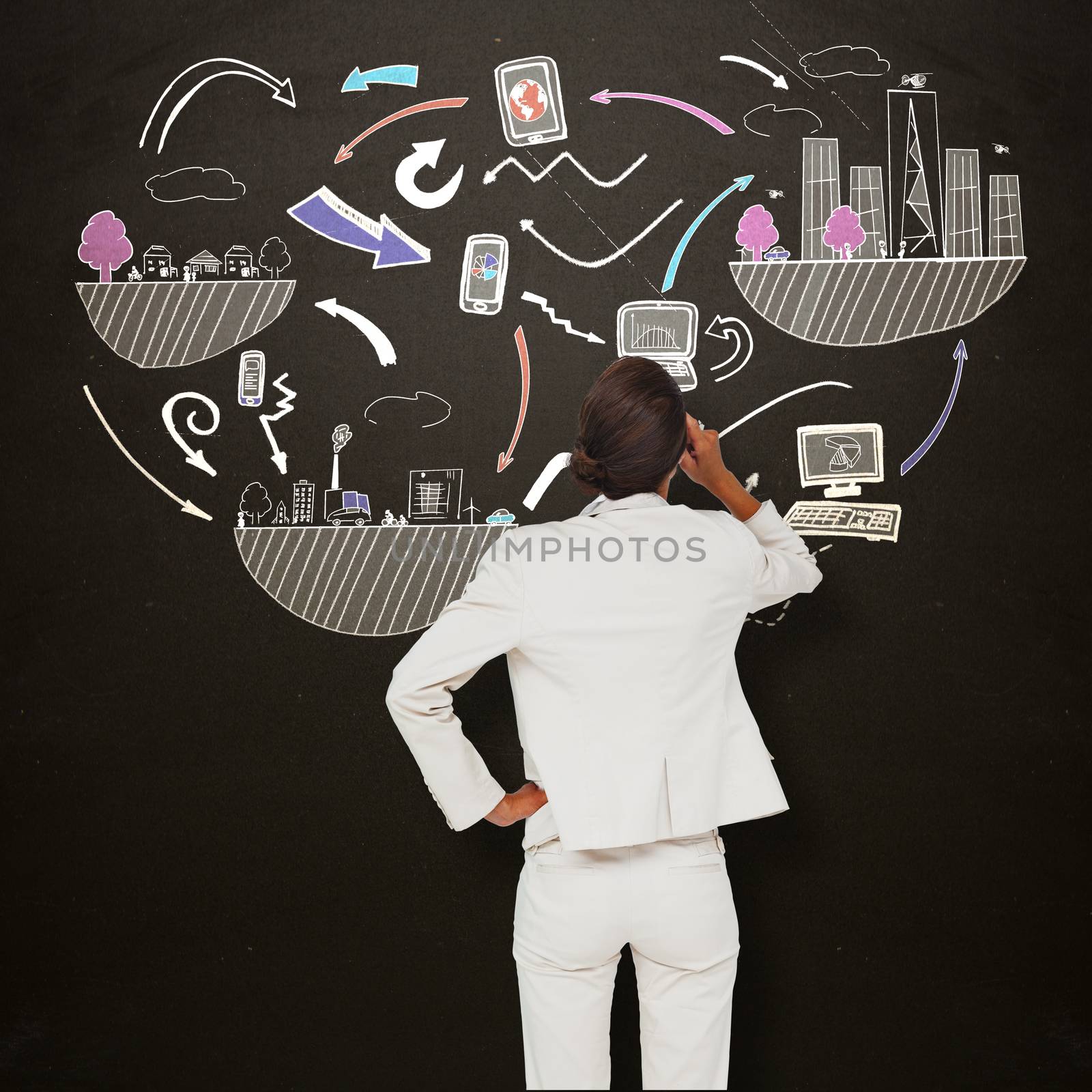 Thinking businesswoman against blackboard