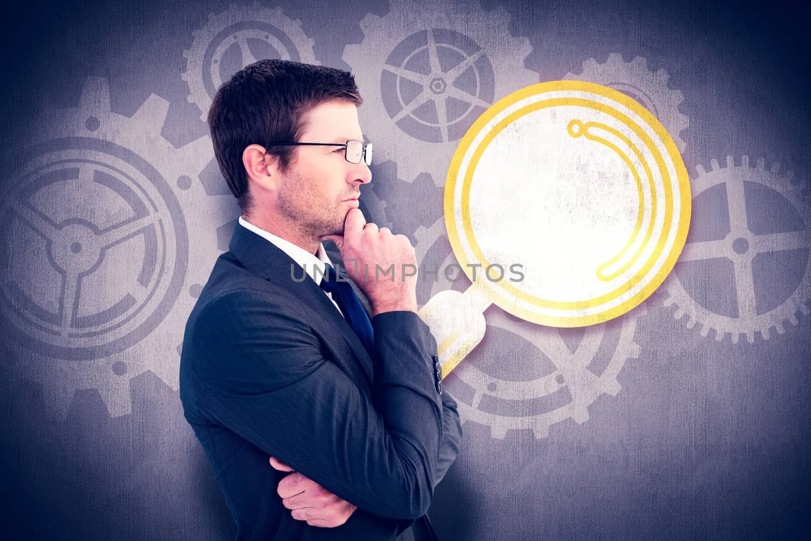 Frowning businessman thinking  against white and grey background