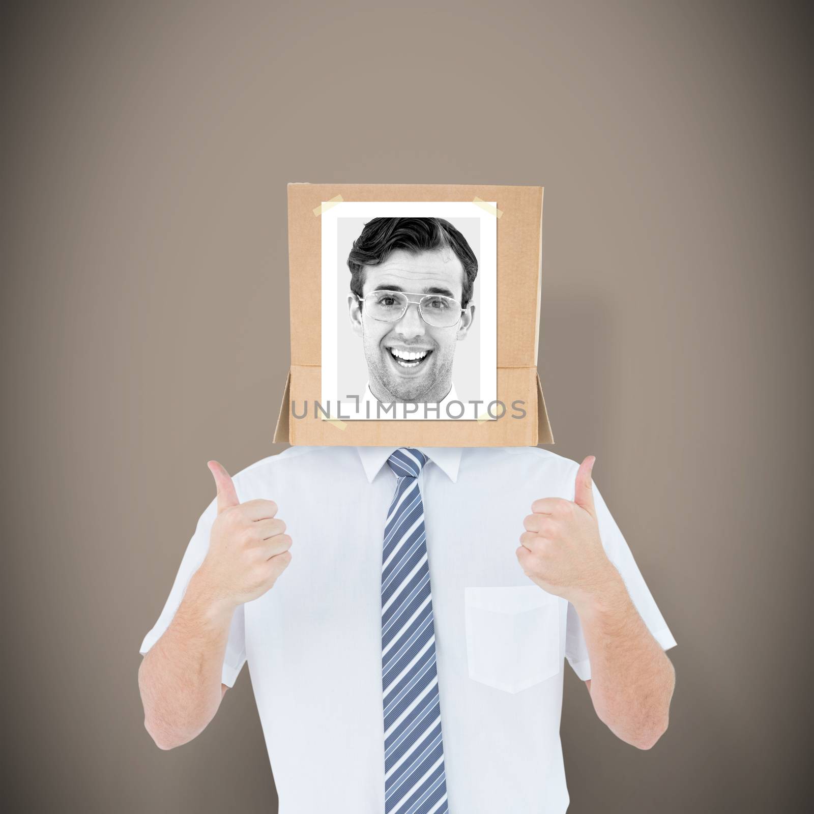 Composite image of businessman with photo box on head by Wavebreakmedia