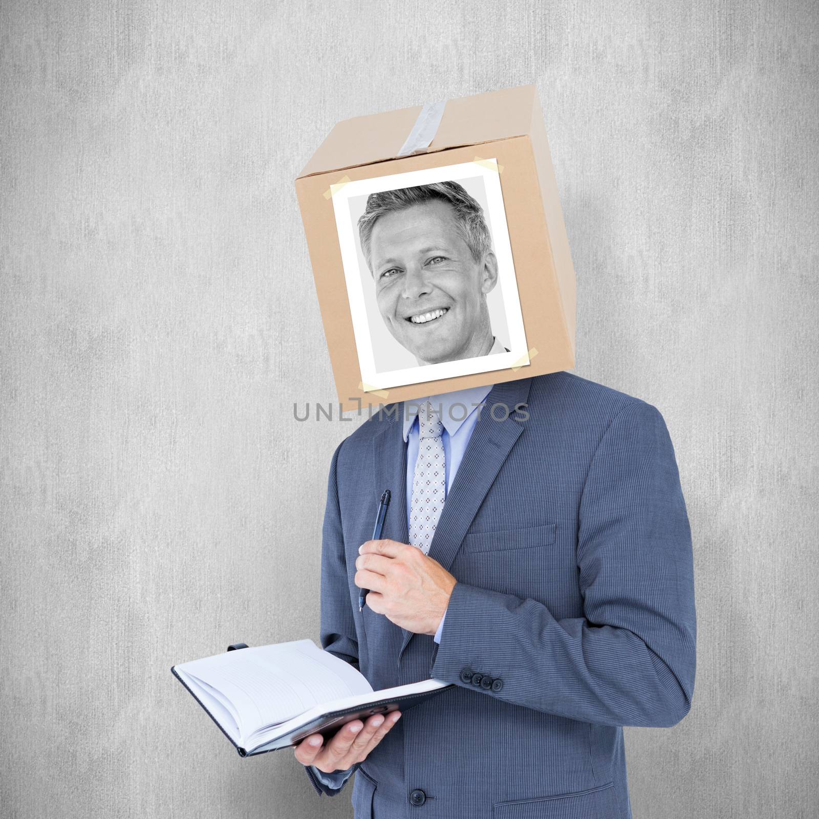 Businessman with photo box on head against white background