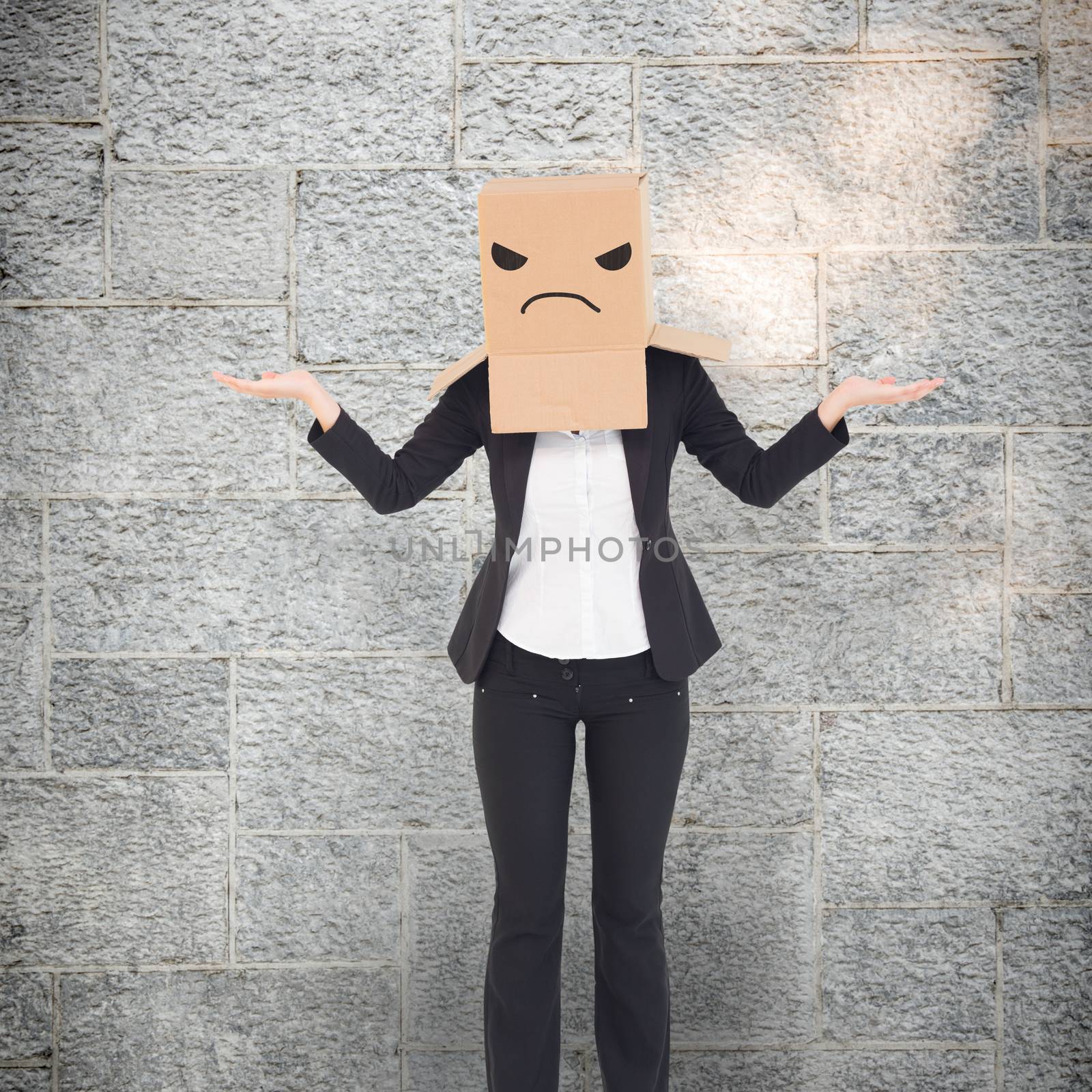 Composite image of businesswoman with box over head by Wavebreakmedia