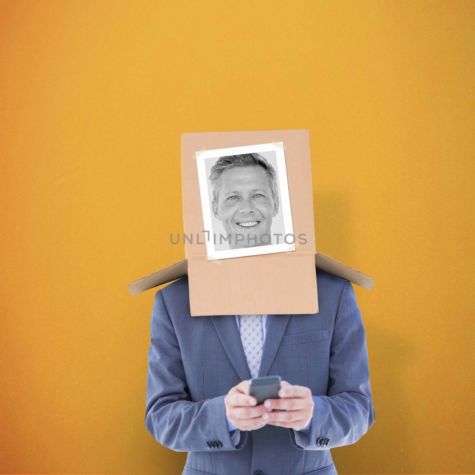 Composite image of businessman with photo box on head by Wavebreakmedia