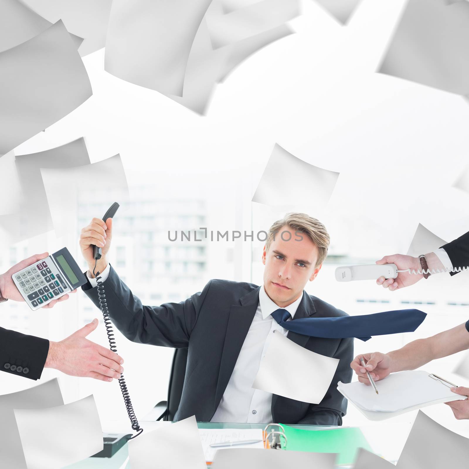 Businessman in suit offering his hand against businessman holding out phone at office