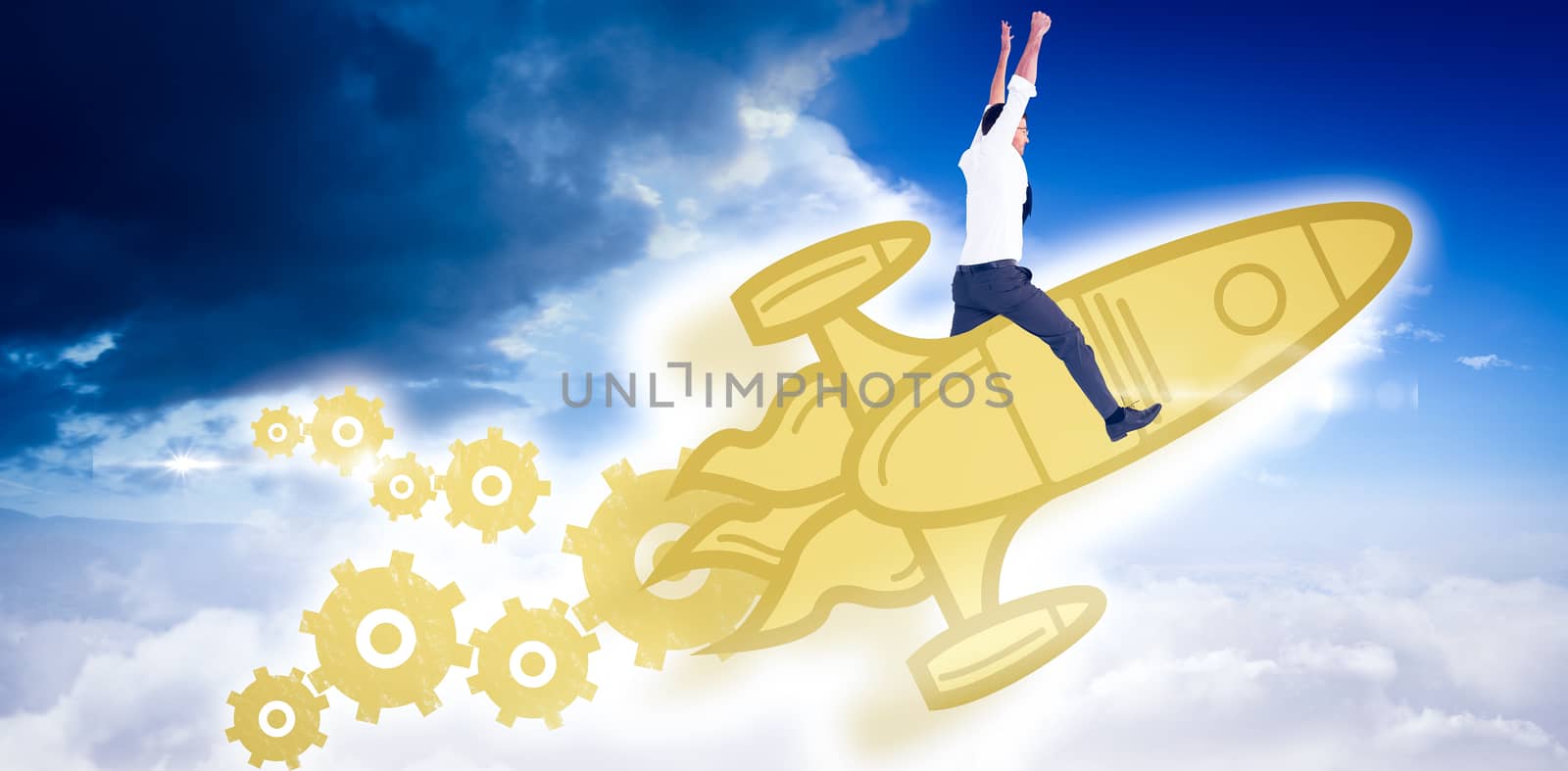 Cheering businessman against bright blue sky with clouds