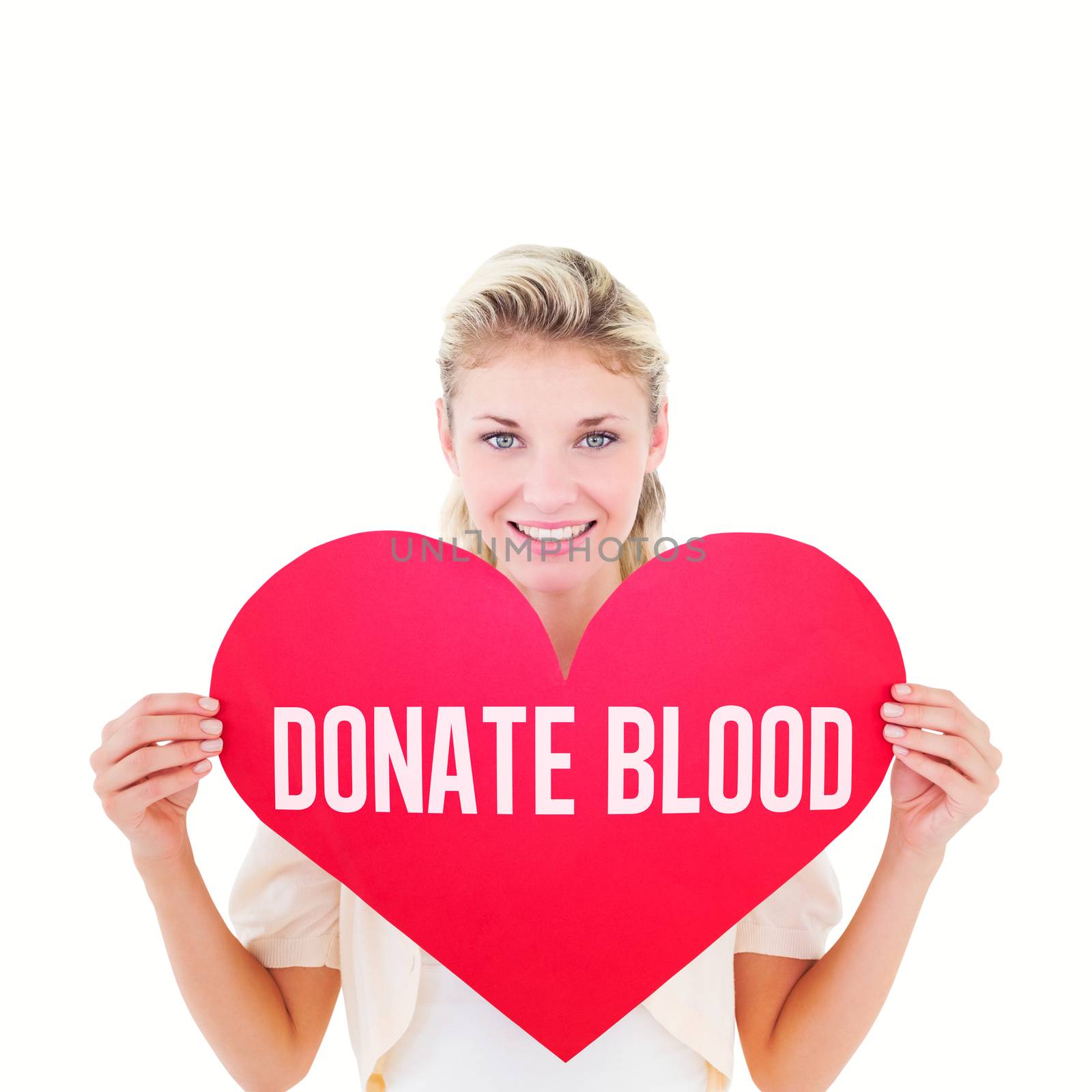 Attractive young blonde showing red heart against donate blood