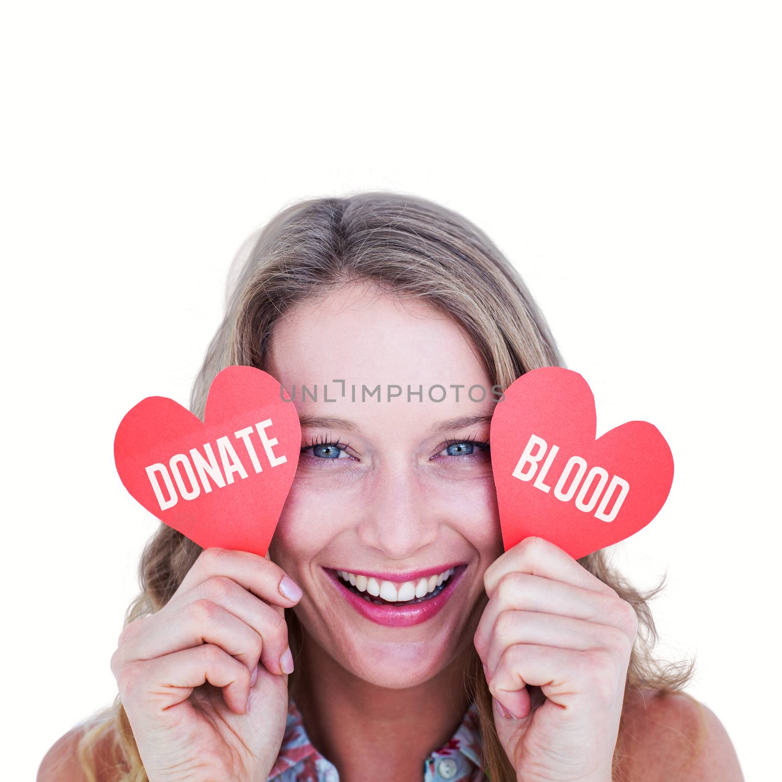 Composite image of woman holding heart cards  by Wavebreakmedia