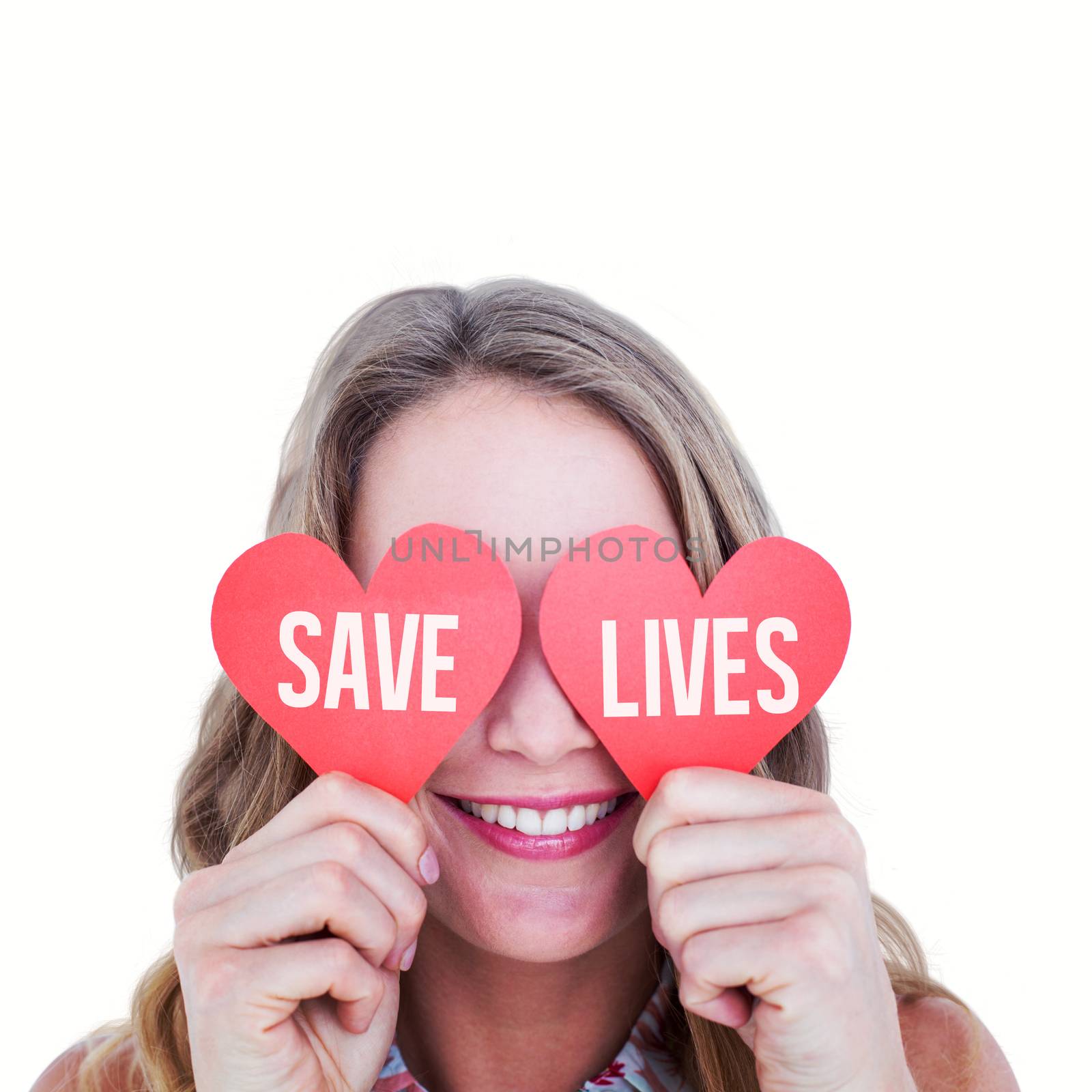 Composite image of woman holding heart cards  by Wavebreakmedia