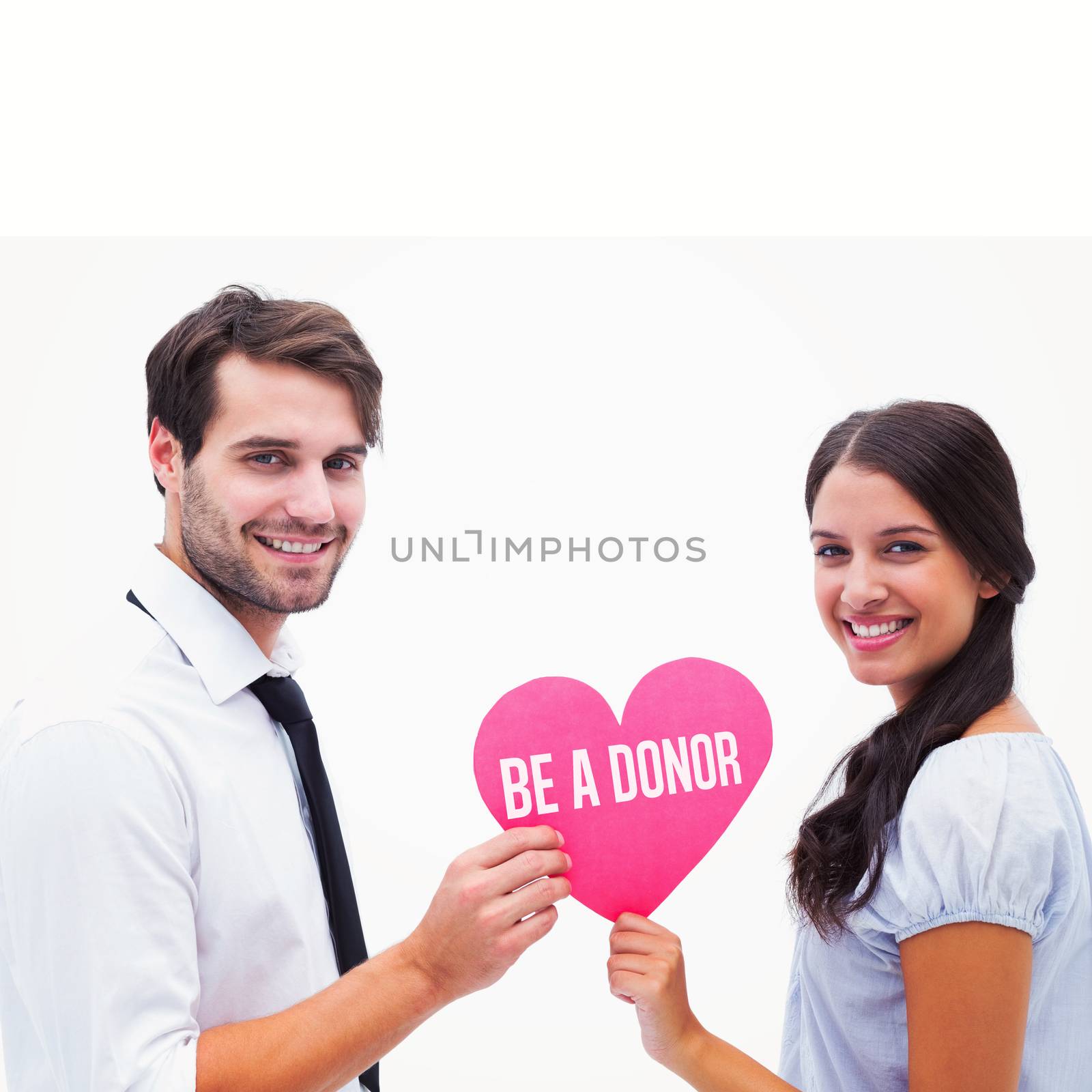 Composite image of pretty brunette giving boyfriend her heart by Wavebreakmedia