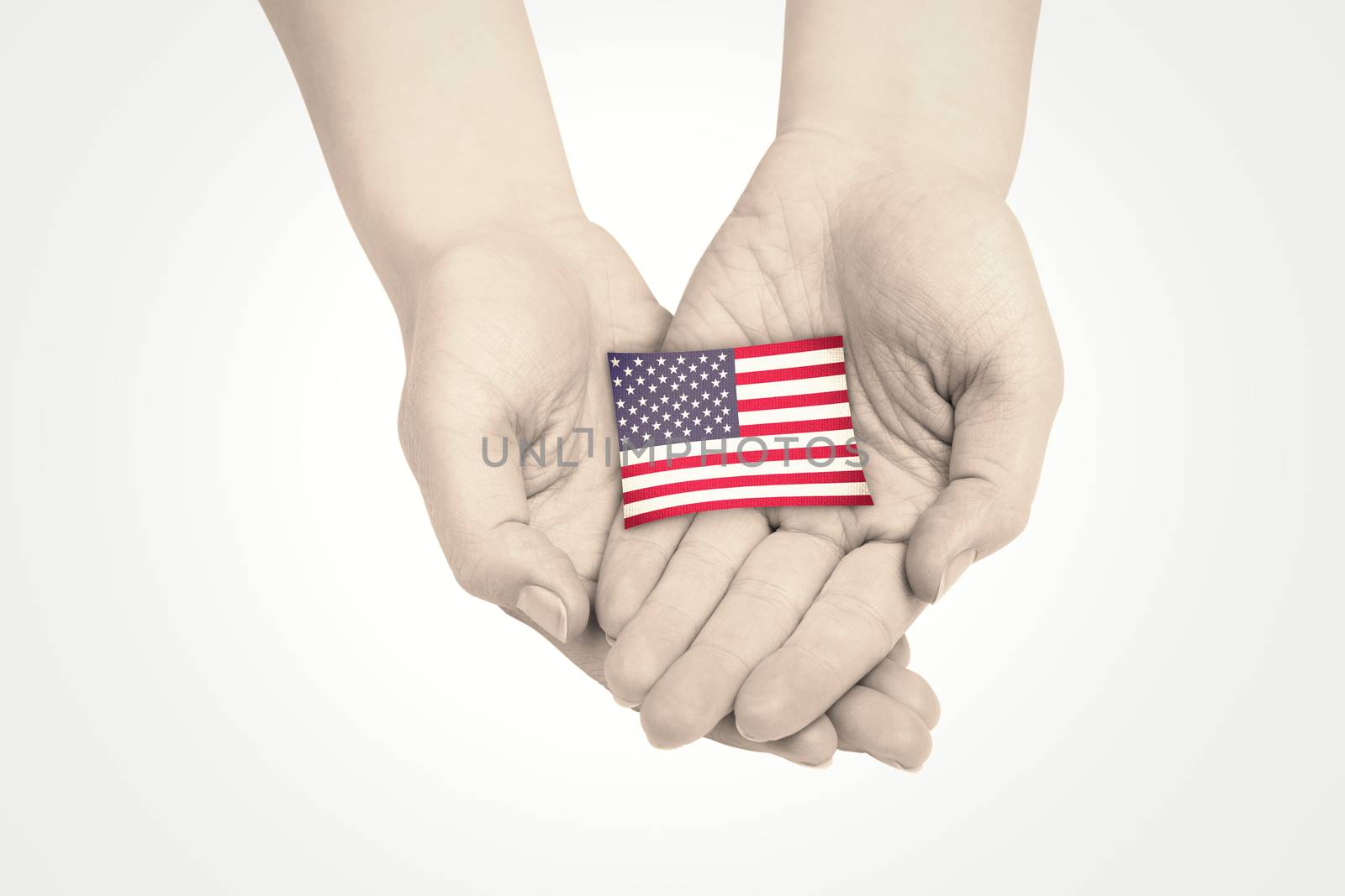 Hands presenting against usa national flag