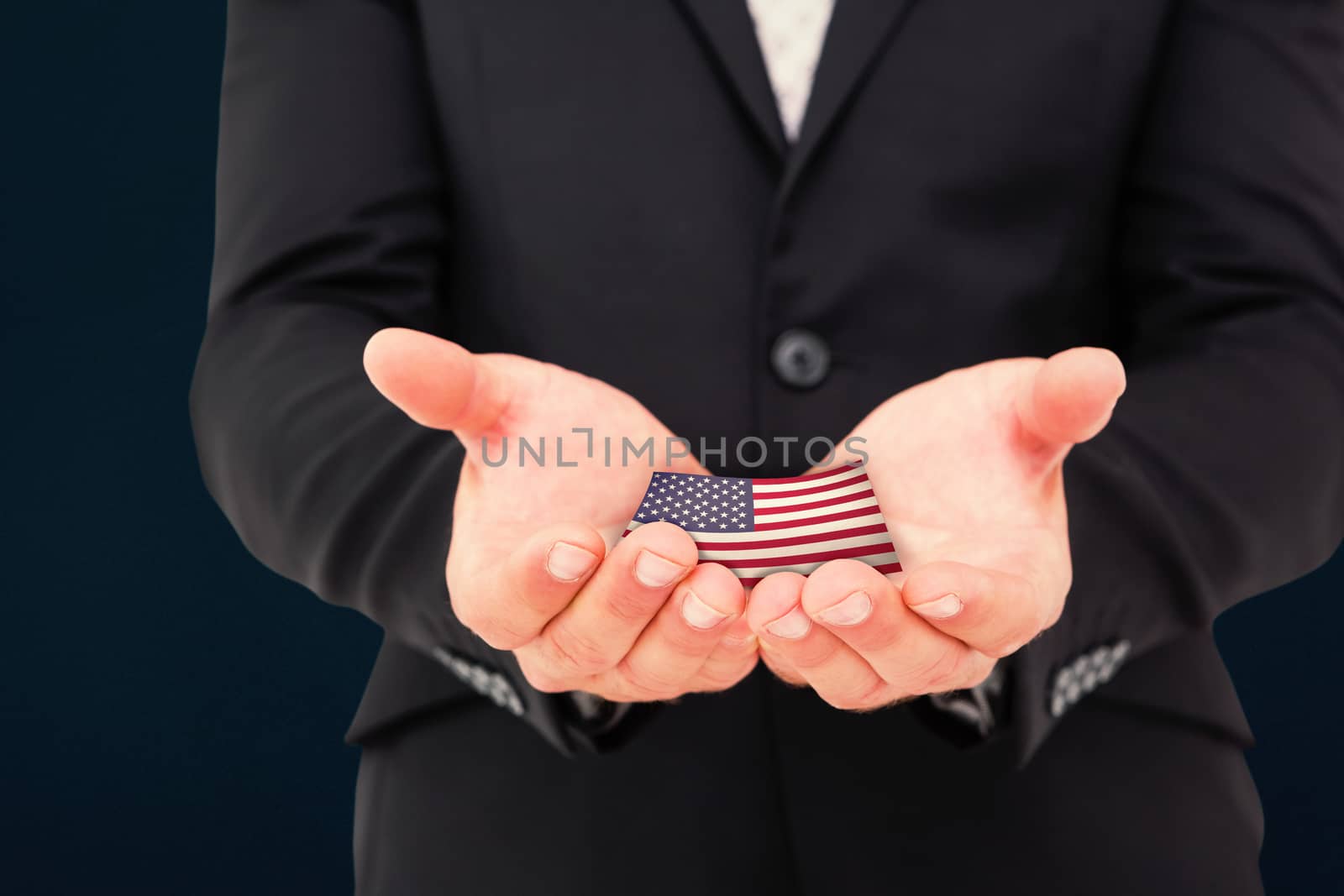 Composite image of businessman holding his hands out by Wavebreakmedia