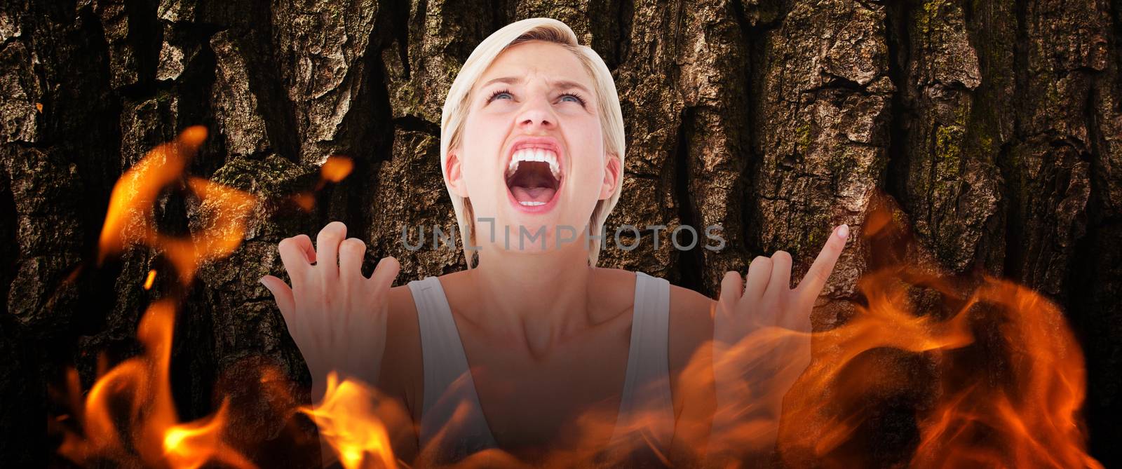 Upset woman screaming with hands up  against brown rough bark