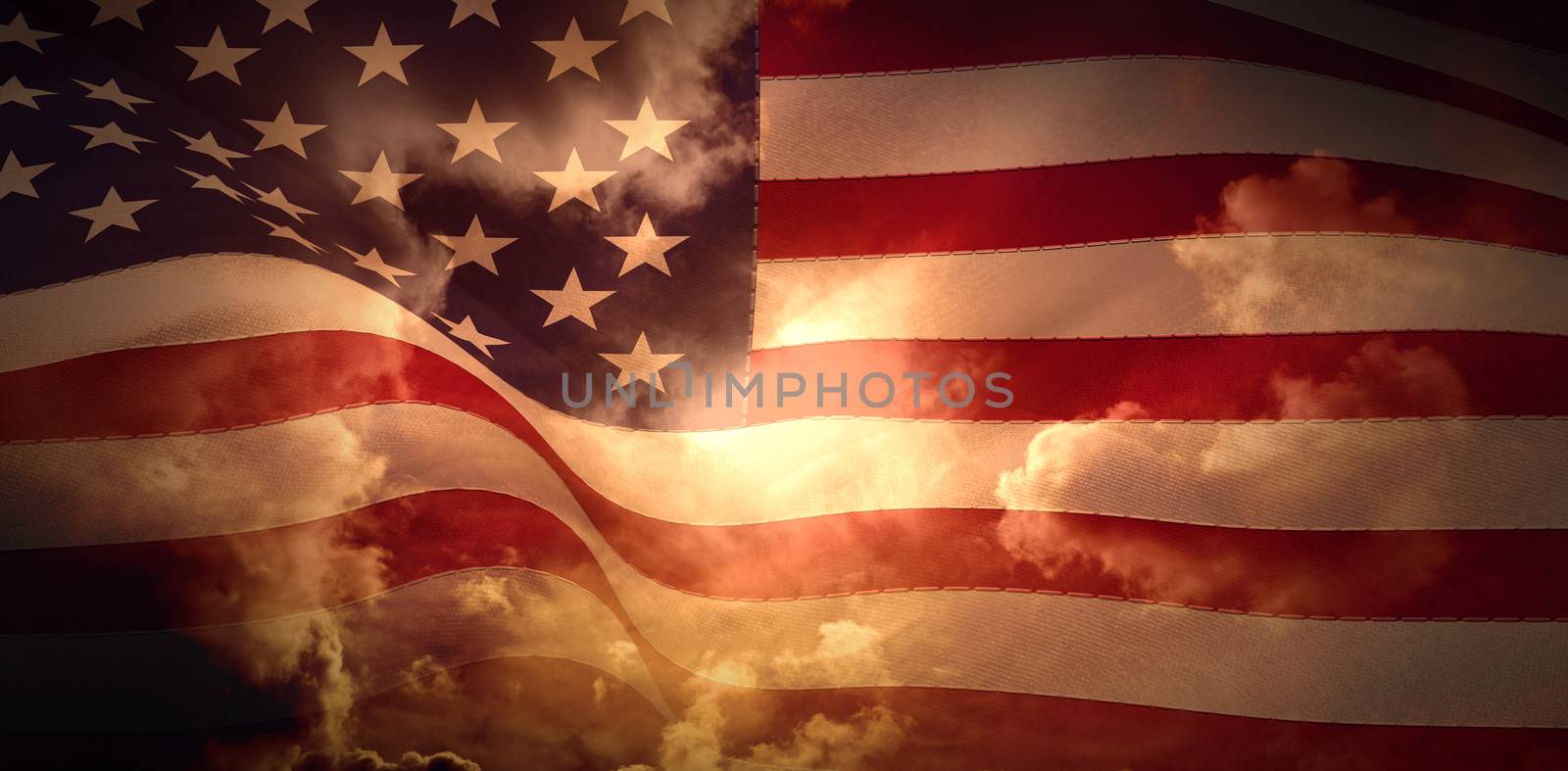 Digitally generated united states national flag against orange sky