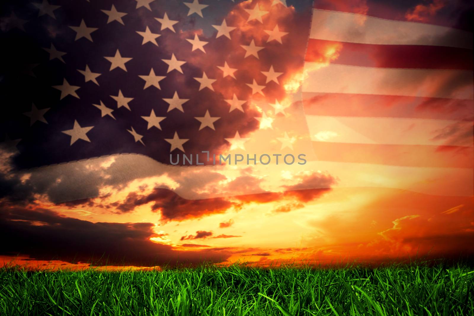 United states of america flag against green grass under dark blue and orange sky