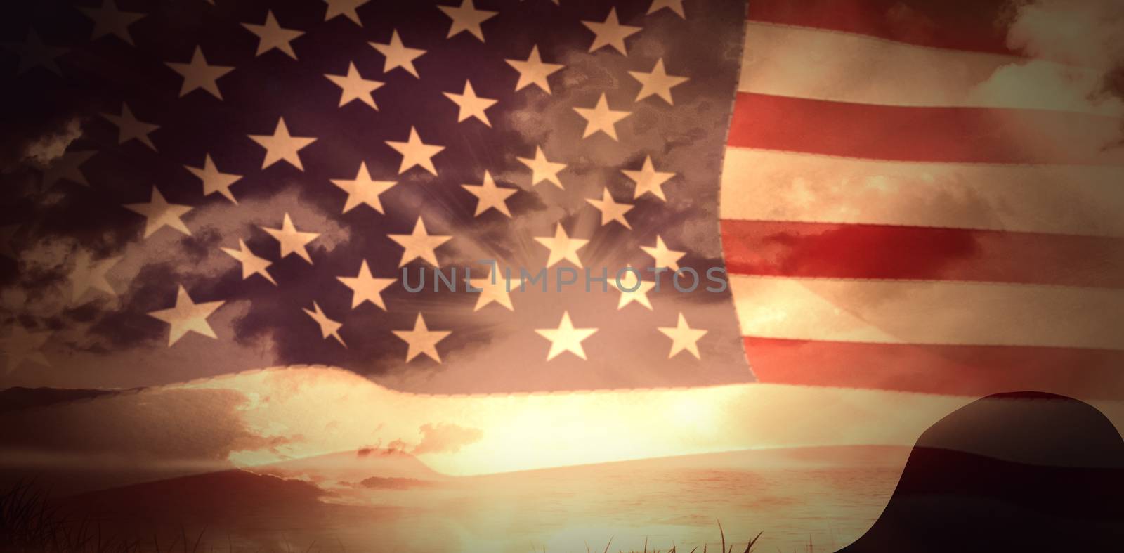 United states of america flag against sunrise over grass