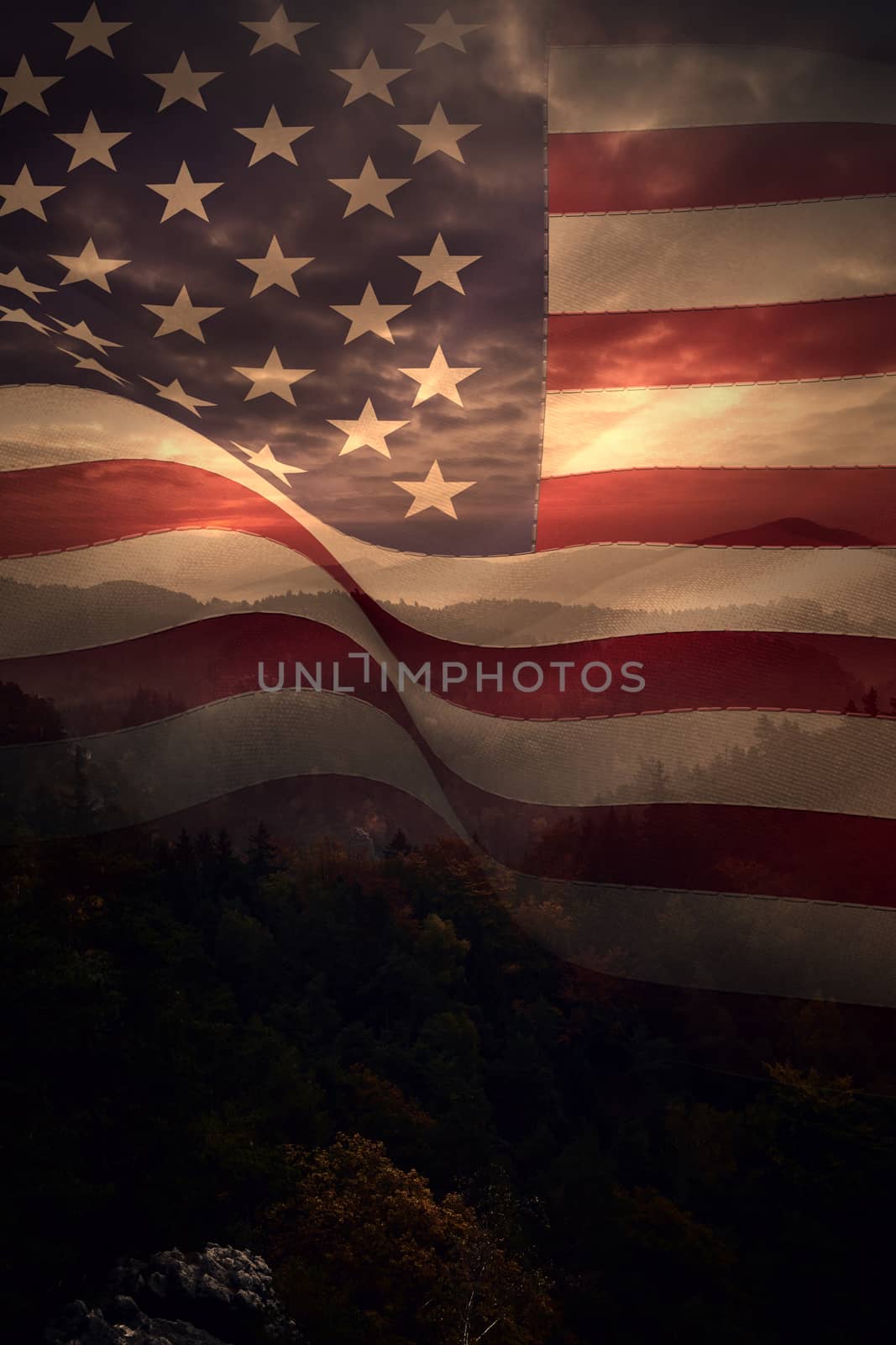 Digitally generated united states national flag against trees and mountain range against cloudy sky