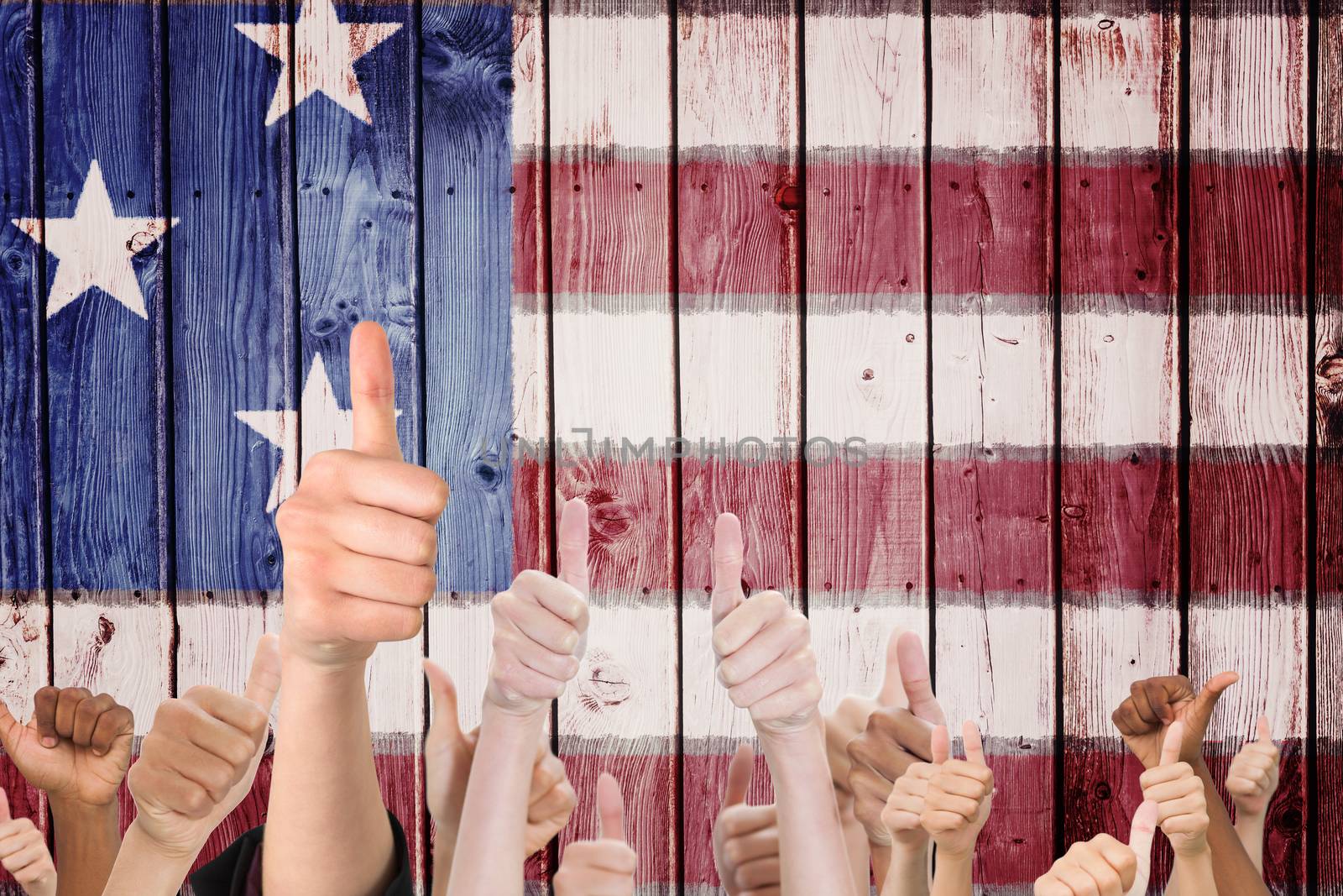 Composite image of hands showing thumbs up by Wavebreakmedia