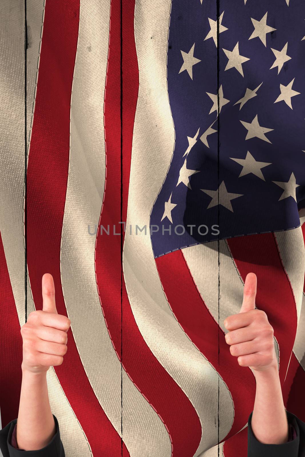Composite image of businesswomans hands showing thumbs up by Wavebreakmedia