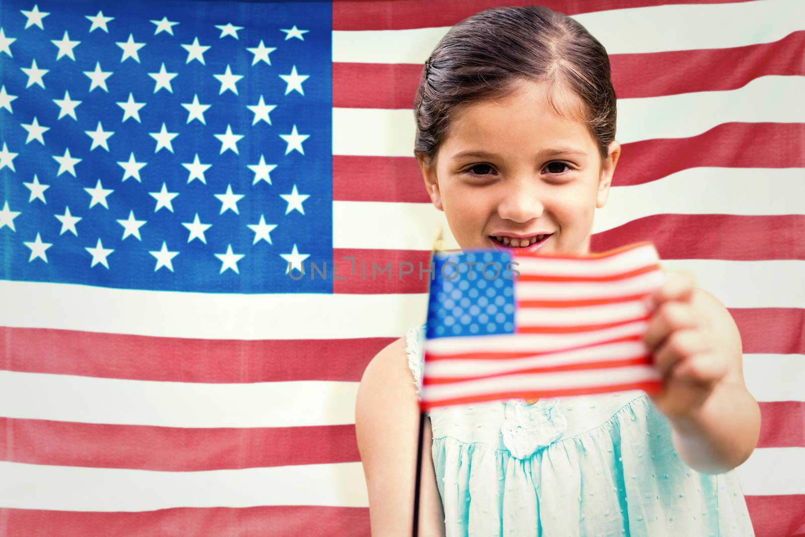 Cute girl with american flag against rippled us flag