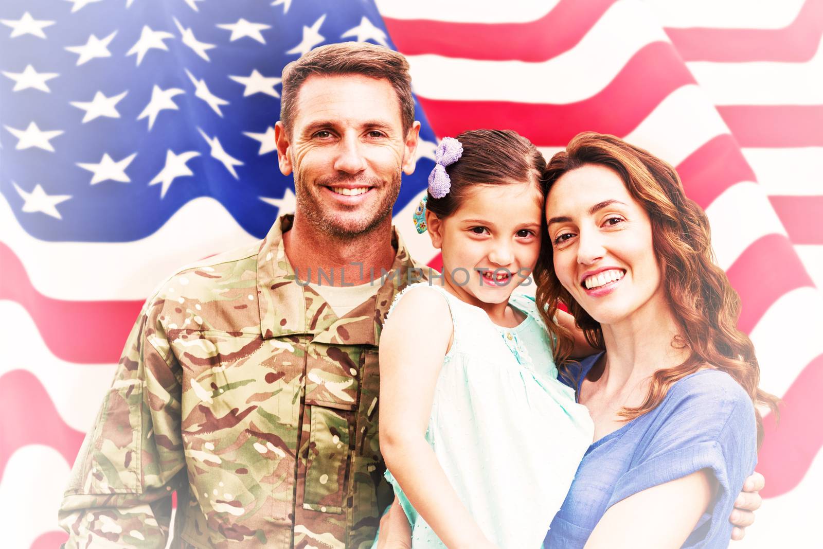 Composite image of soldier reunited with family by Wavebreakmedia