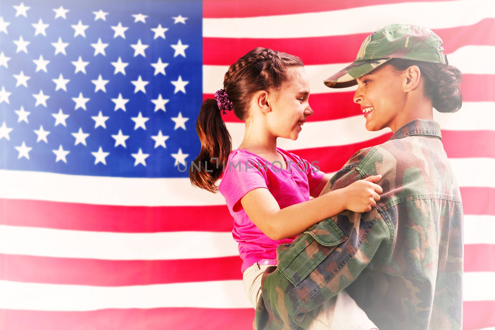 Solider reunited with daughter against rippled us flag