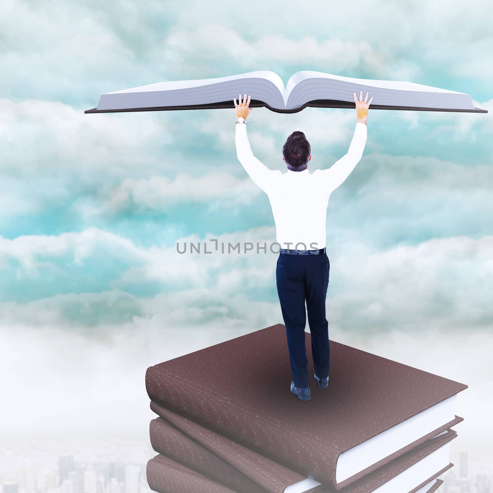 Composite image of businessman with arms raised by Wavebreakmedia