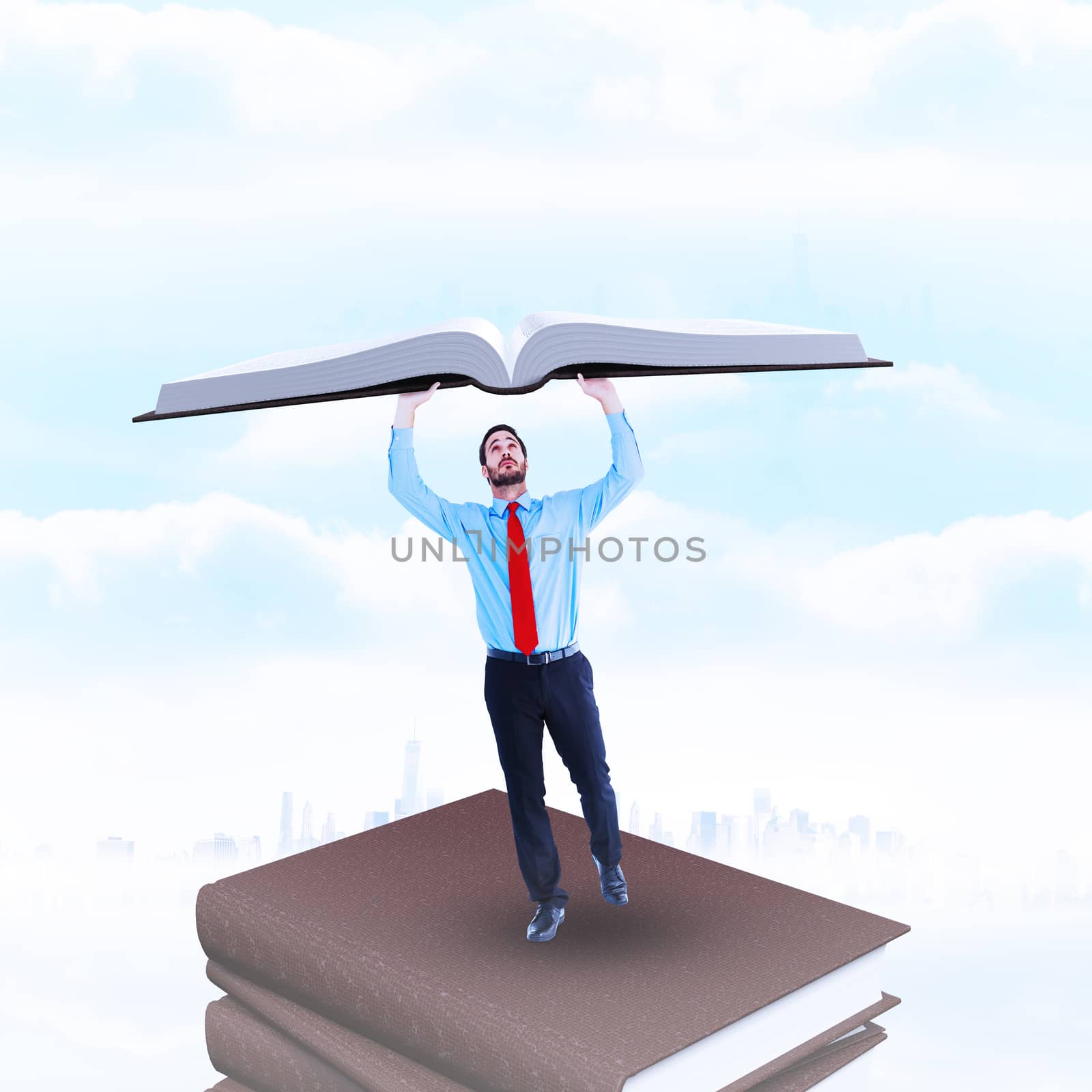 Composite image of businessman in suit pushing up with effort by Wavebreakmedia