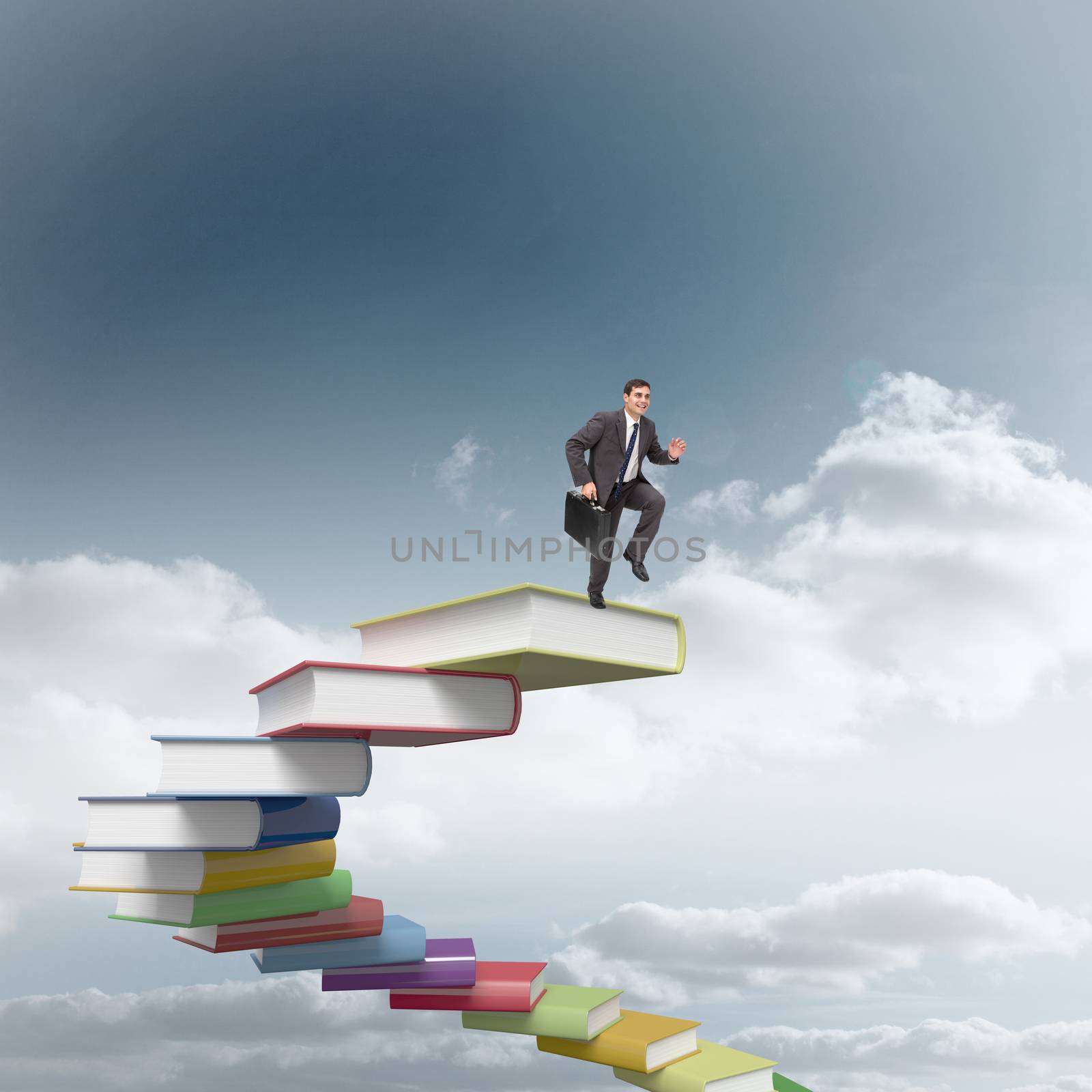 Cheerful businessman in a hurry against stack of books
