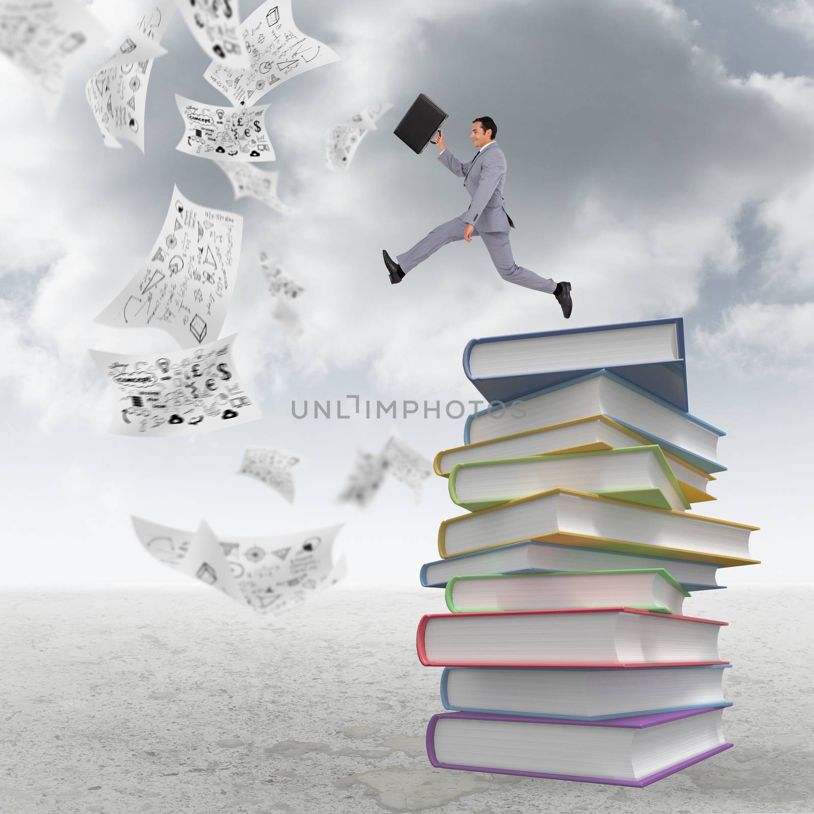 Businessman running with a suitcase against stack of books
