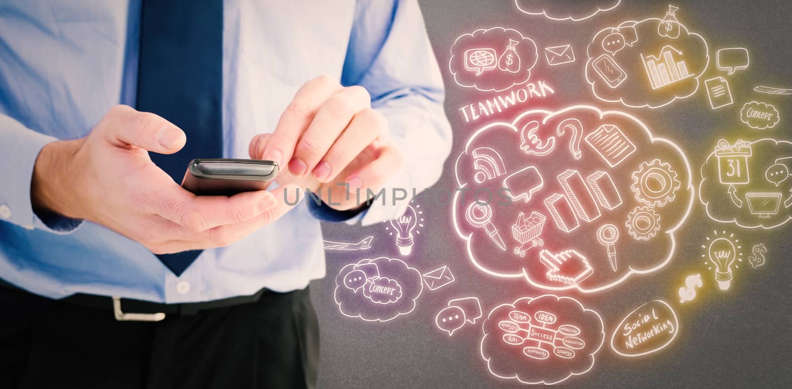 Close up of a businessman using a smartphone against grey background