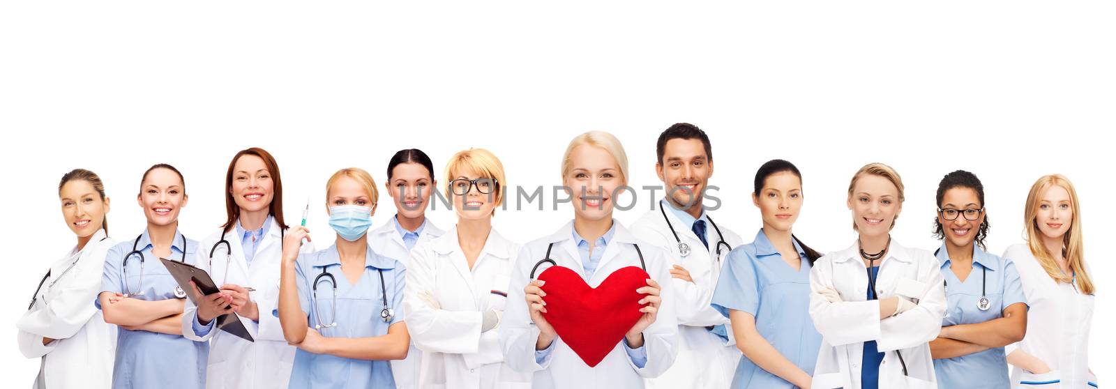 smiling doctors and nurses with red heart by dolgachov