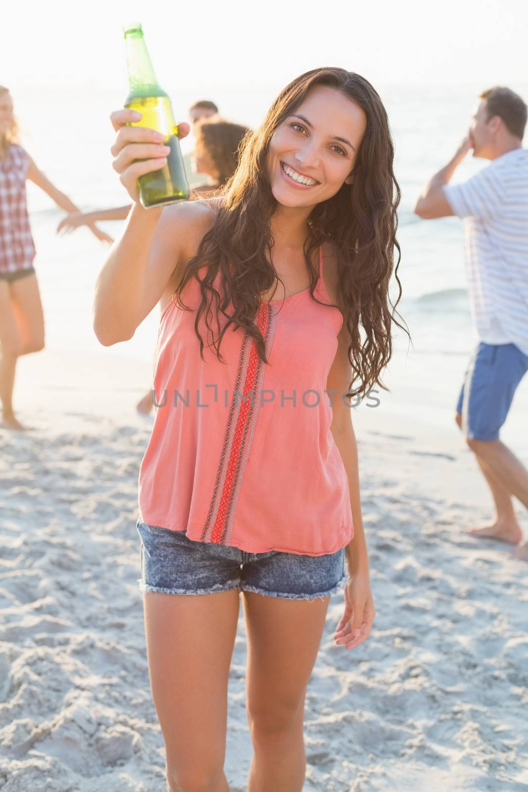 group of friends having fun at the beach