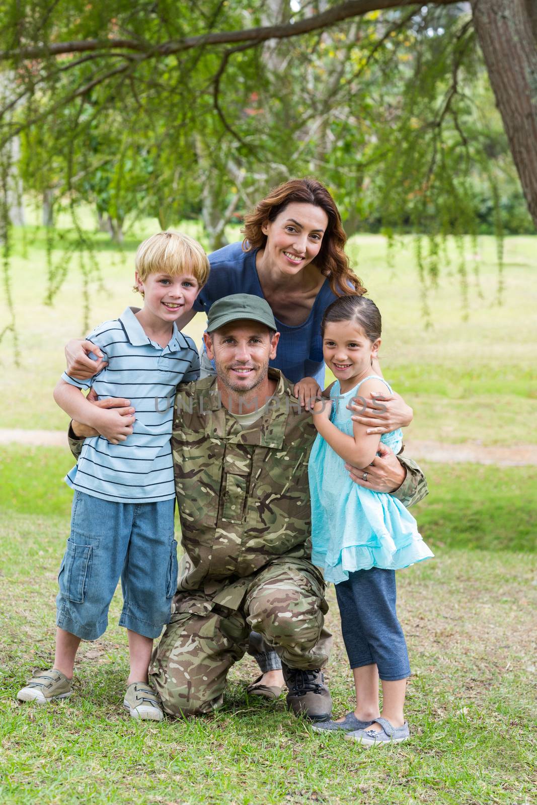 Handsome soldier reunited with family  by Wavebreakmedia