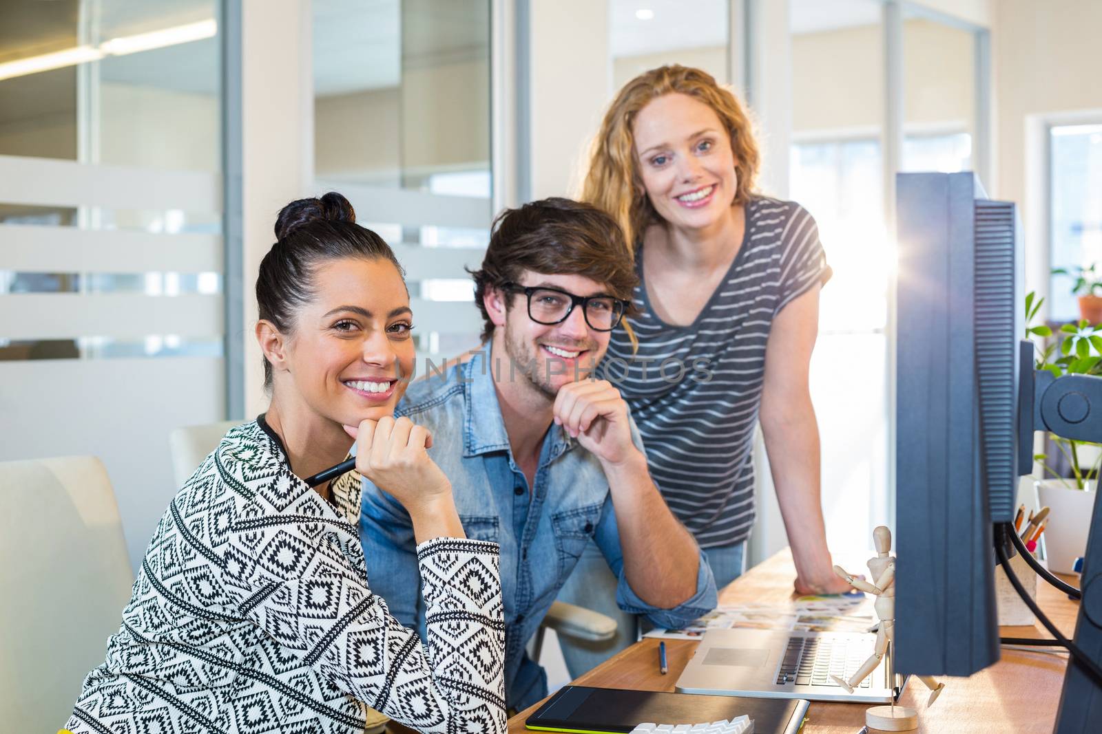 Professional designers working on computer in the office