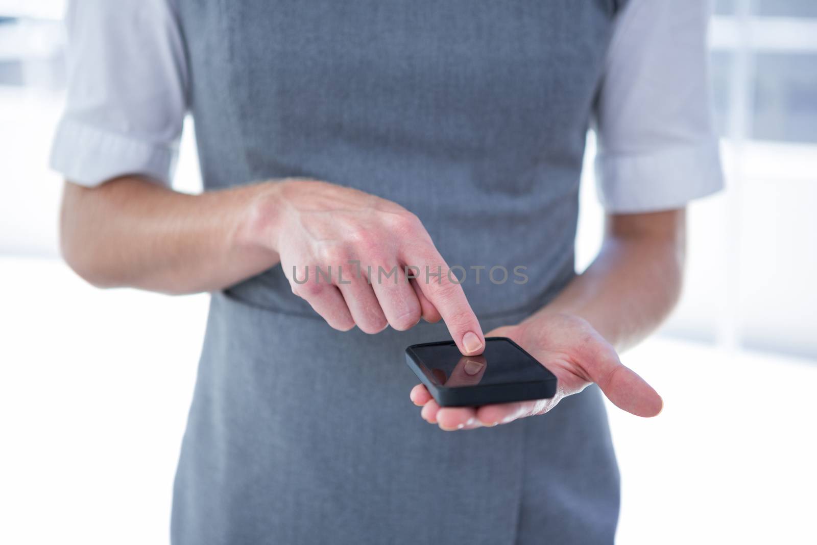 People who texting with his mobile phone  by Wavebreakmedia