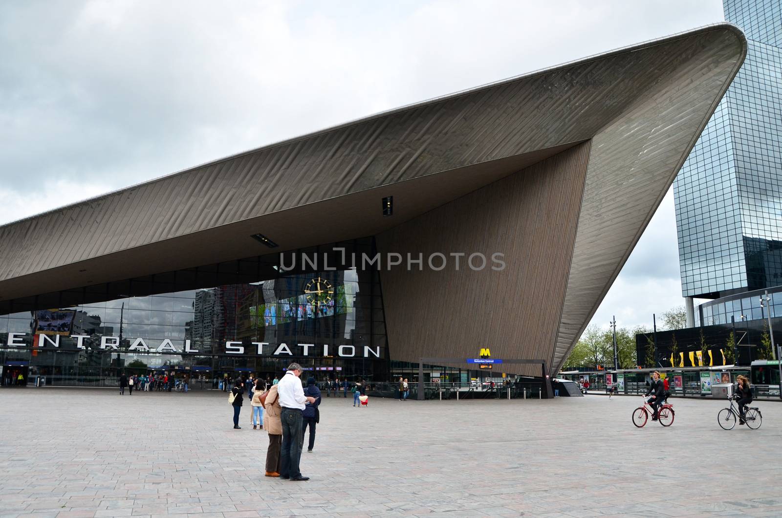 Rotterdam, Netherlands - May 9, 2015: Passengers at Rotterdam Central Station. by siraanamwong