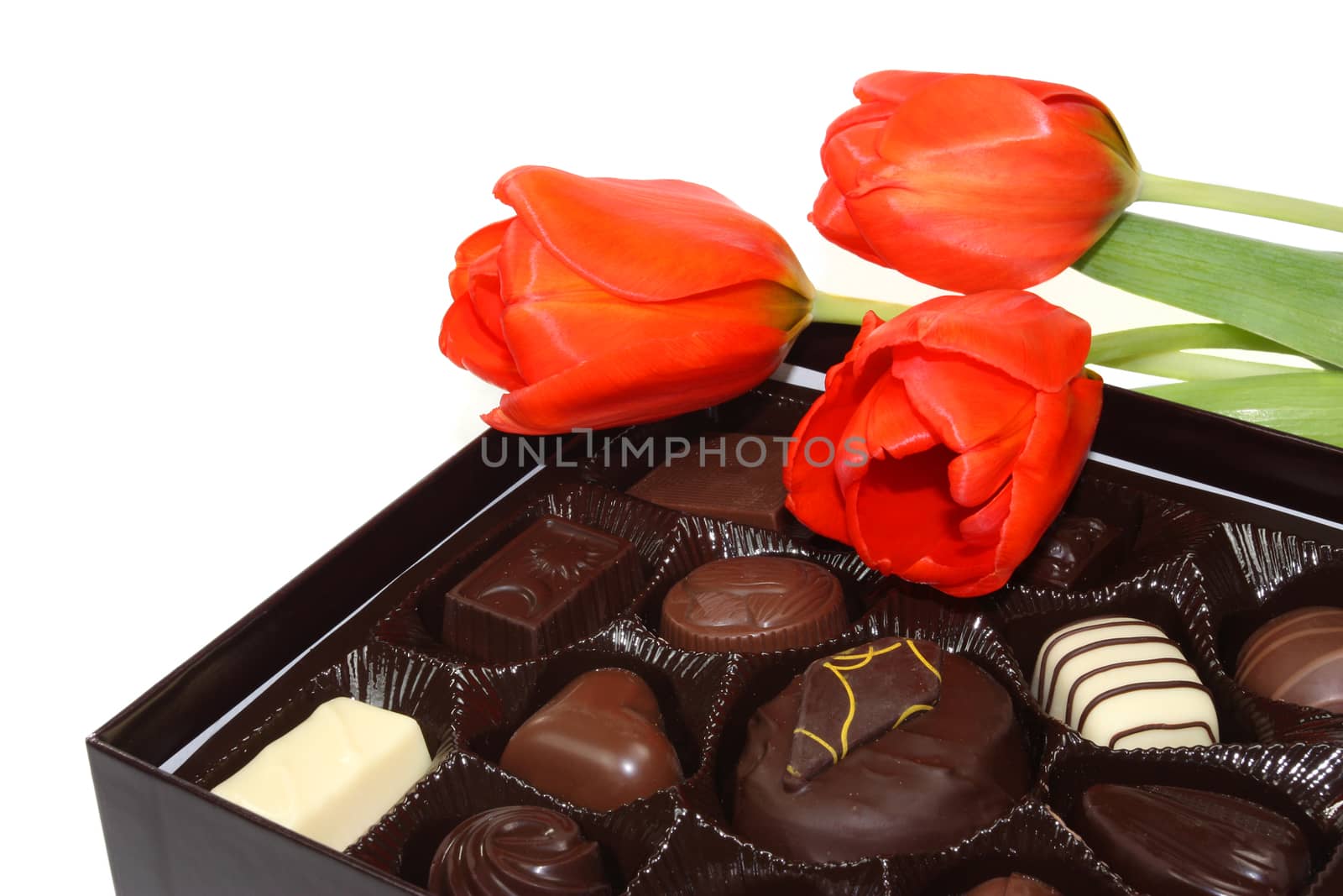 Red tulips and box of chocolate candy