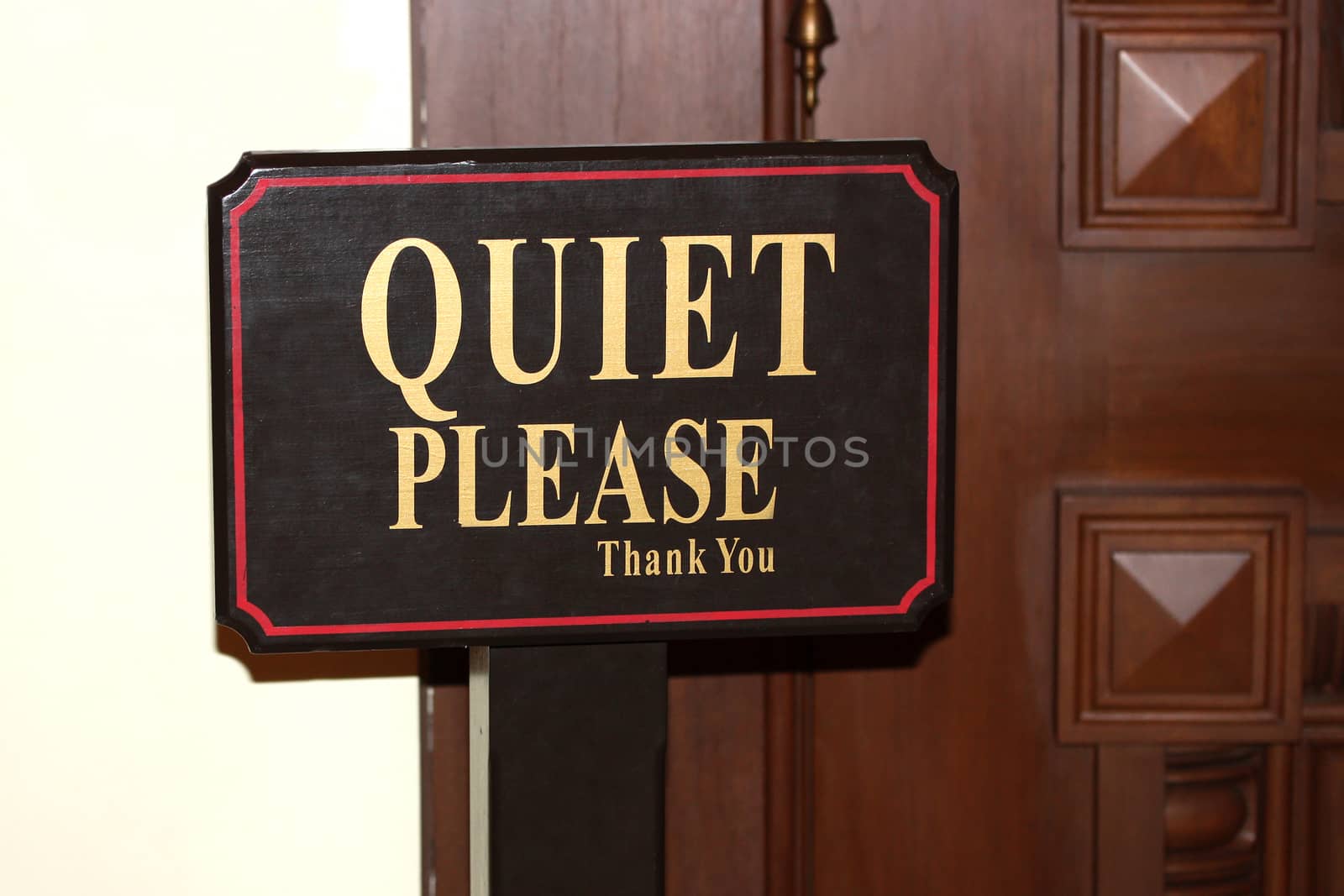 Quiet Please sign near the door