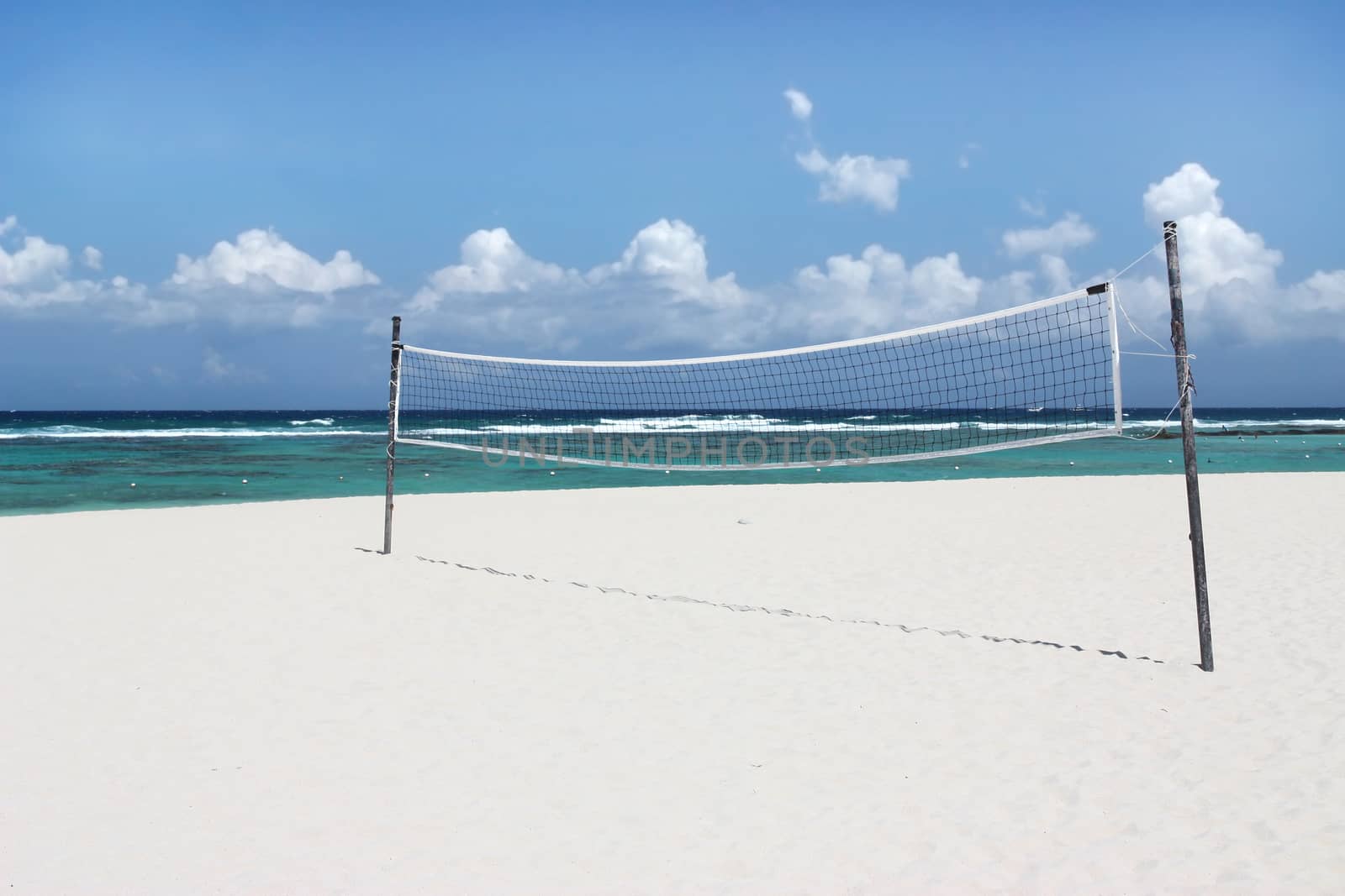 Volleyball net on beautiful tropical beach