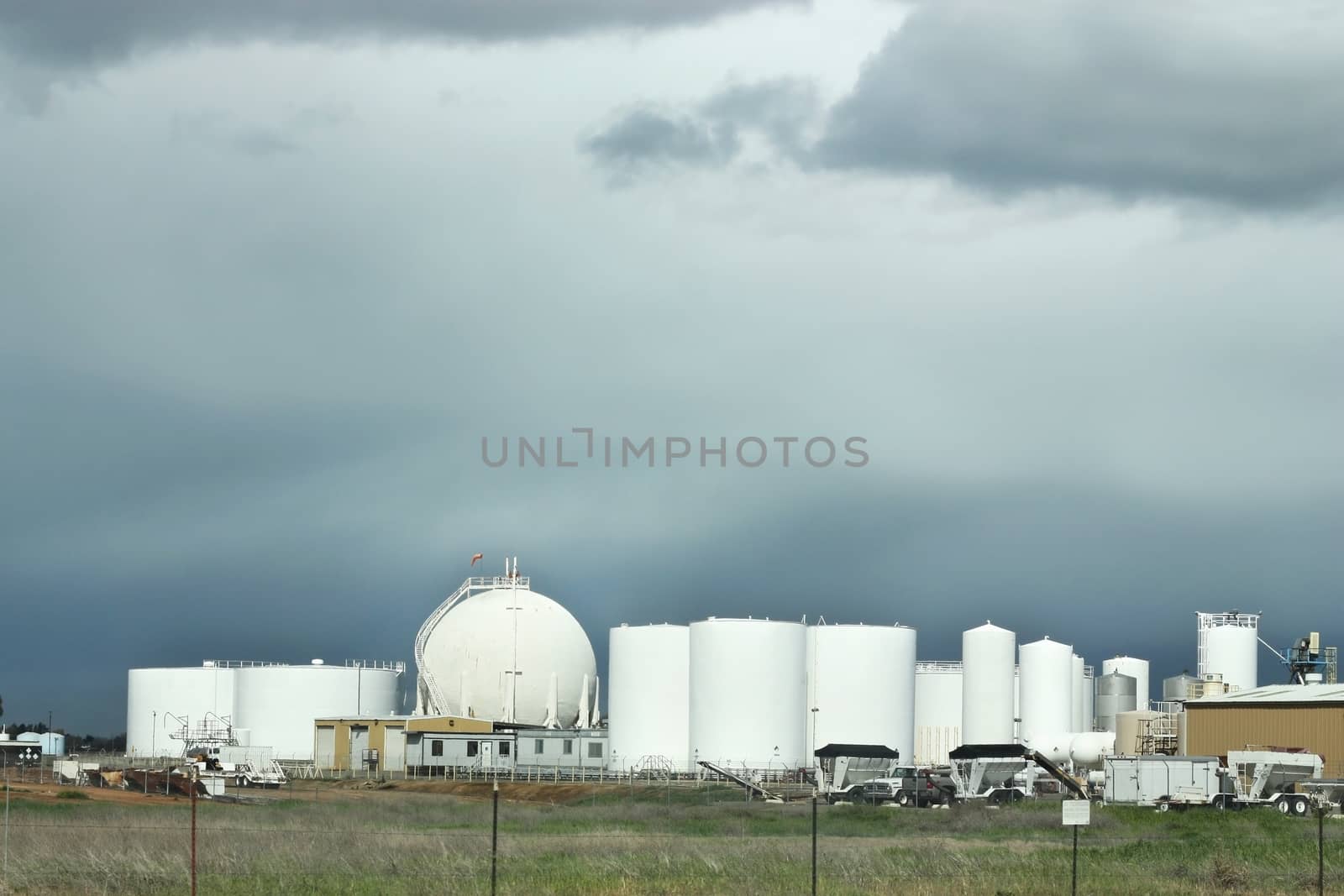 Large industrial factory under cloudy sky