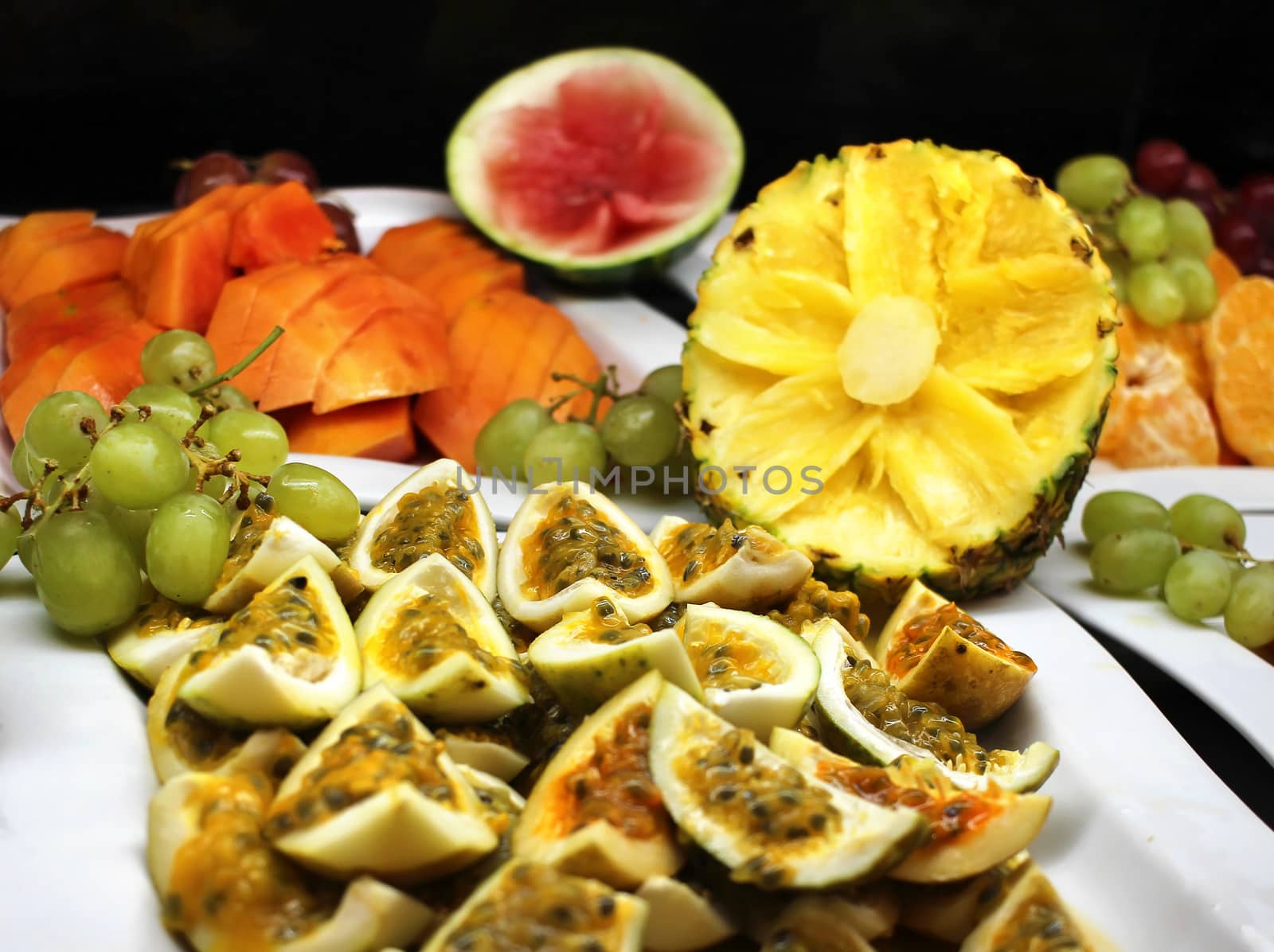 Passion fruit pieces and other tropical fruits