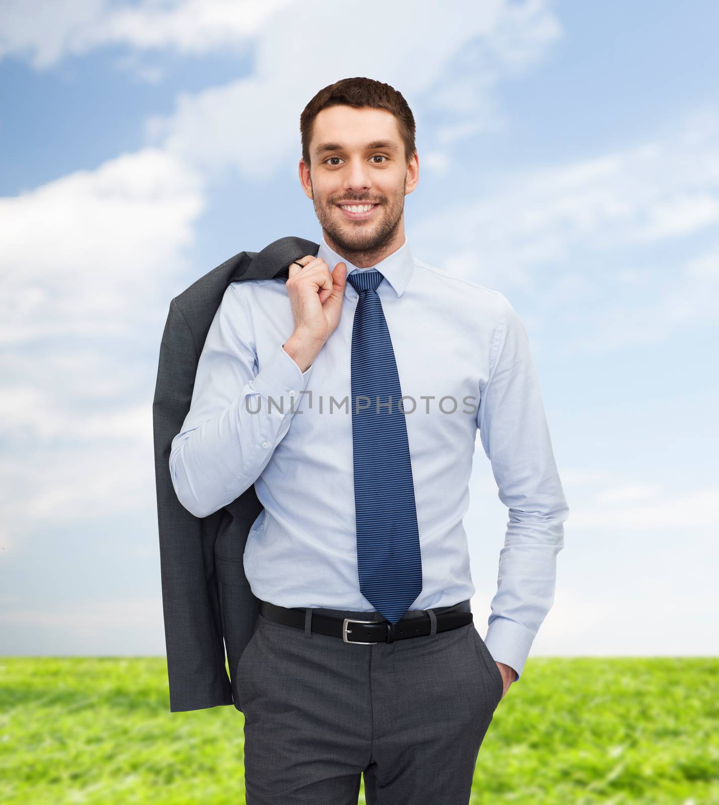 business and people concept - smiling young and handsome businessman