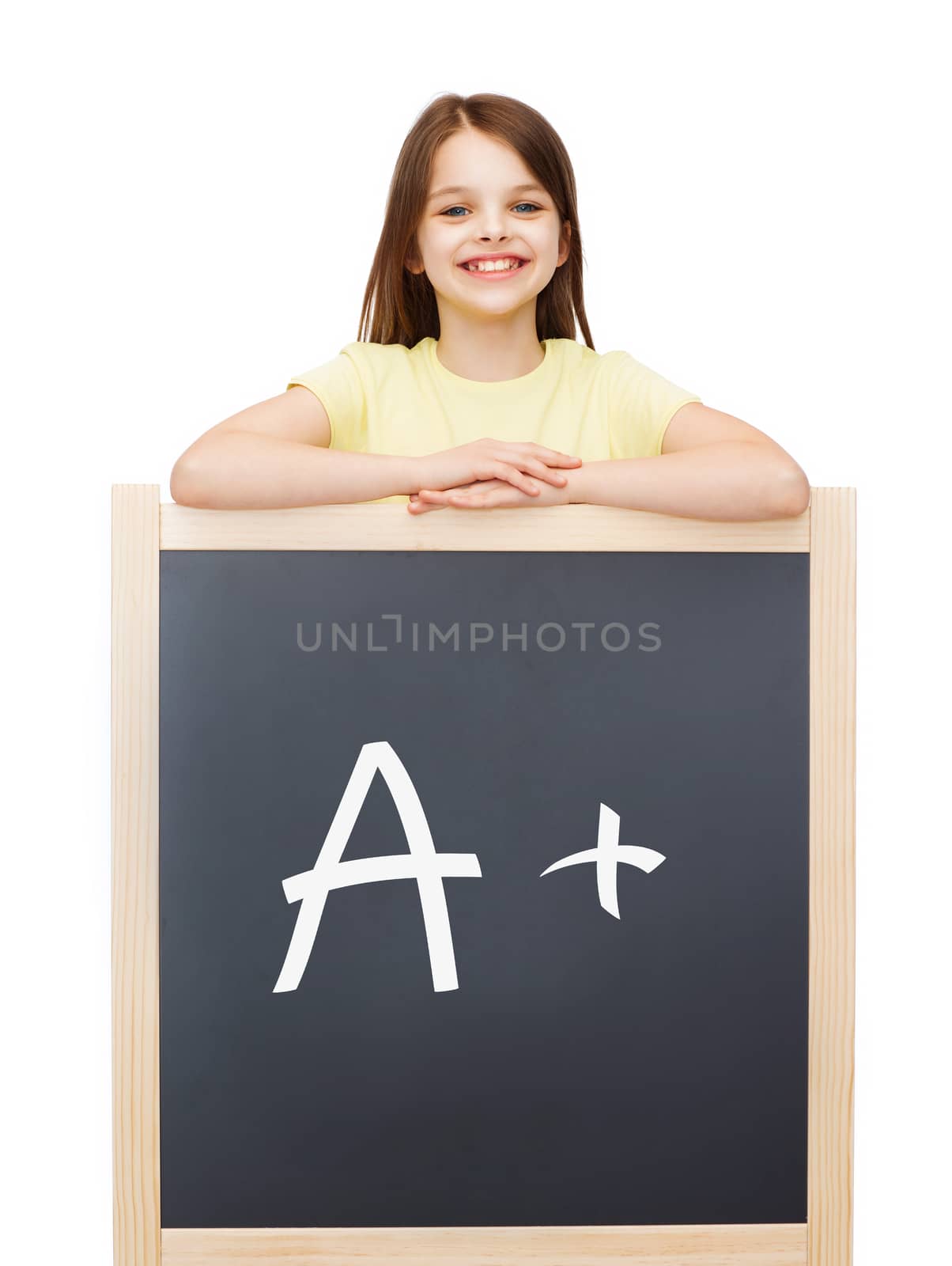 people, childhood, school and education concept - happy little girl with blackboard