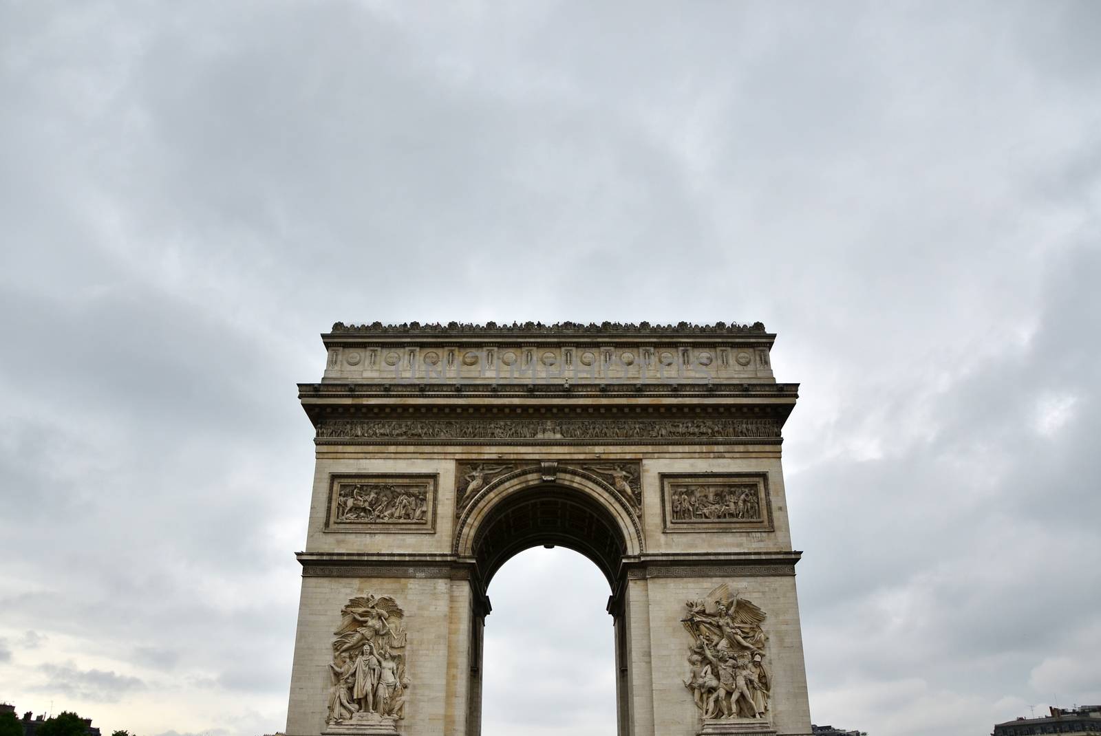 Arc de Triomphe with moody sky by siraanamwong