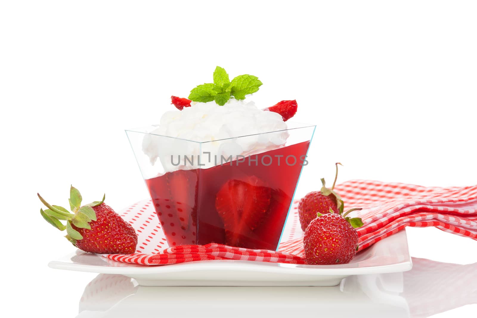 Delicious strawberry jelly dessert isolated on white background. Culinary healthy sweet dessert eating. 